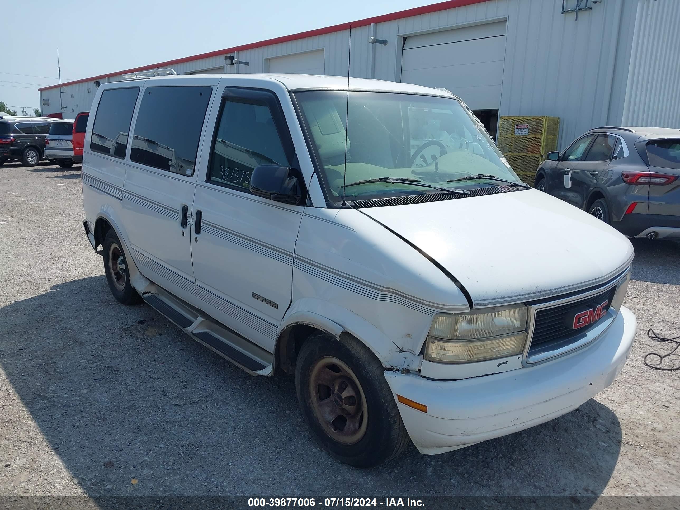 1999 GMC Safari Cargo YF7, VIN 1GDDM19WXXB508764 — Side
