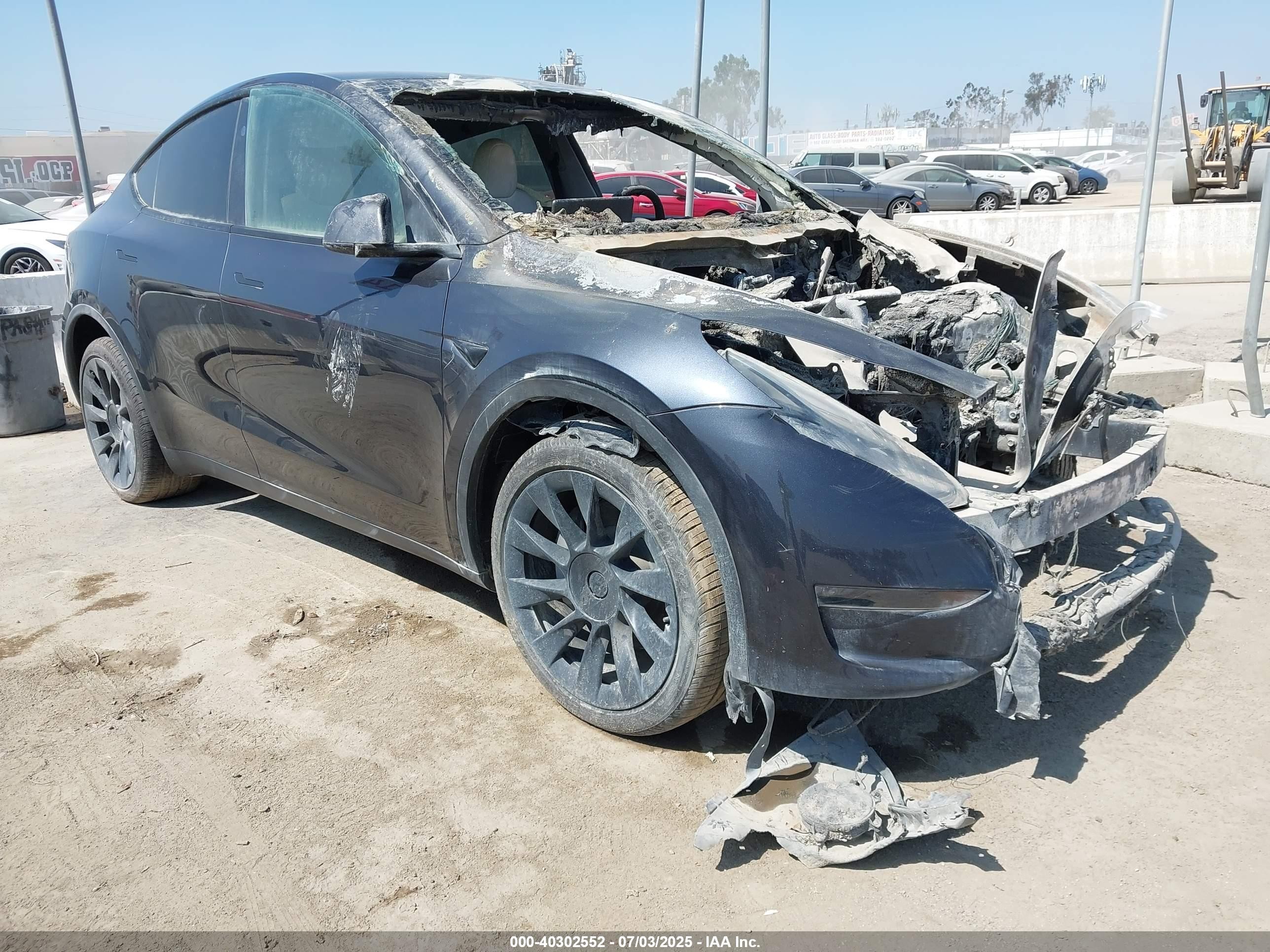 2024 Tesla Model Y Long Range, VIN 7SAYGDEE0RA243073 — Engine fire