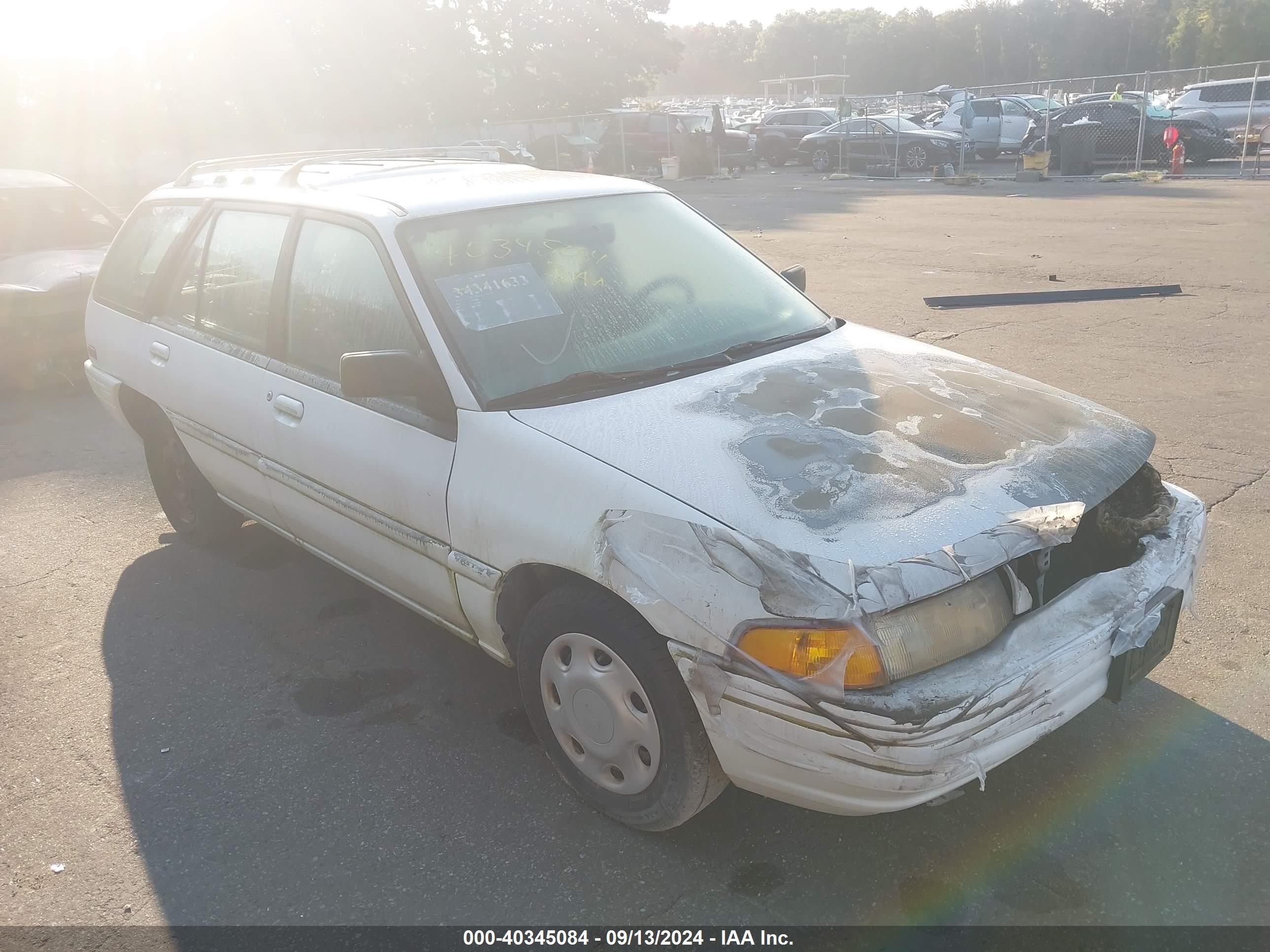 1996 Ford Escort LX, VIN 1FASP15J8TW140509 — Engine fire
