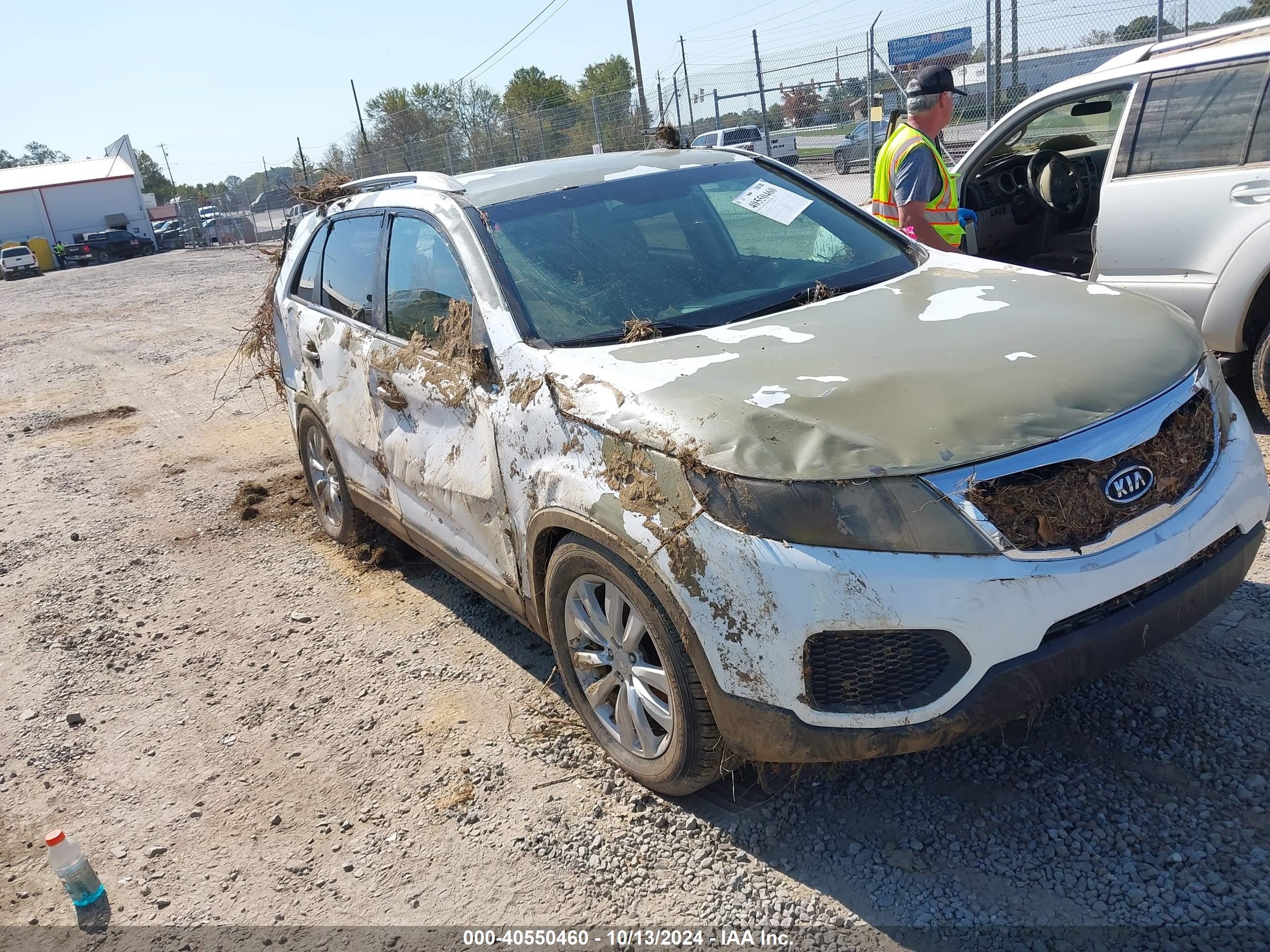 2011 Kia Sorento LX, VIN 5XYKT3A11BG064490 — Water / flood