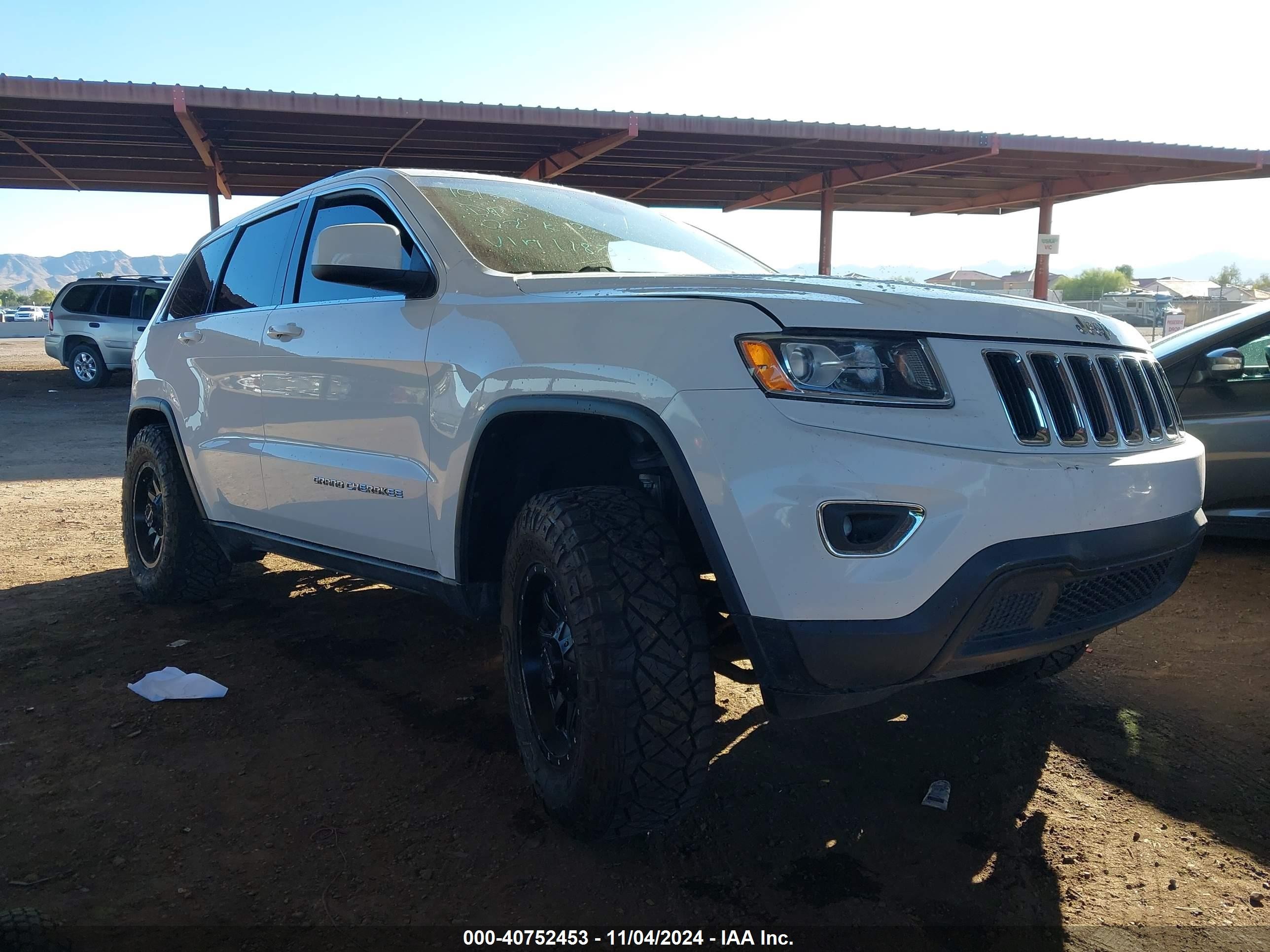 2016 Jeep Grand Cherokee 75th Anniversary, VIN 1C4RJEAG9GC501183 — Бок