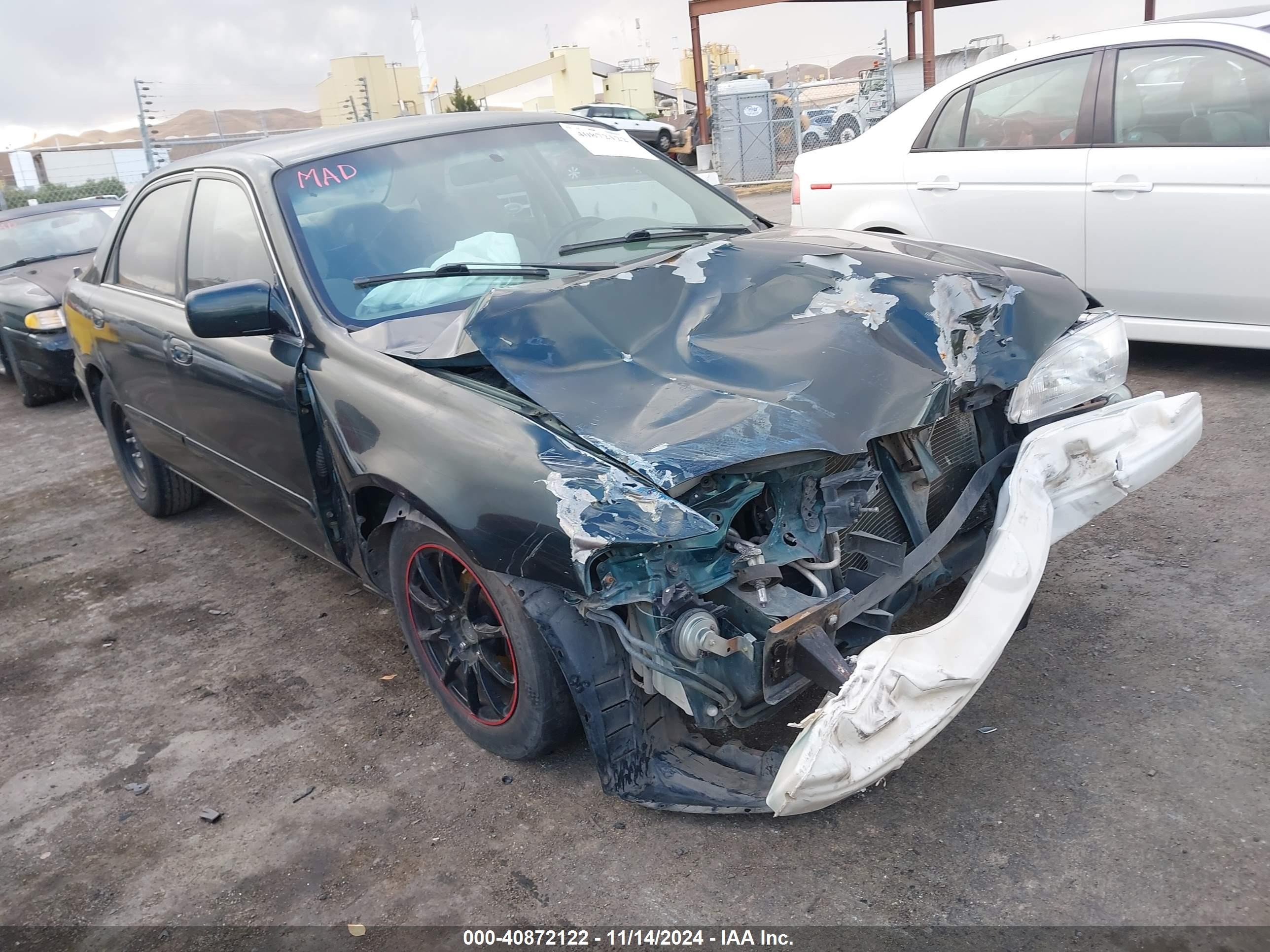 1999 Mazda 626 ES, VIN 1YVGF22C3X5861910 — Front end