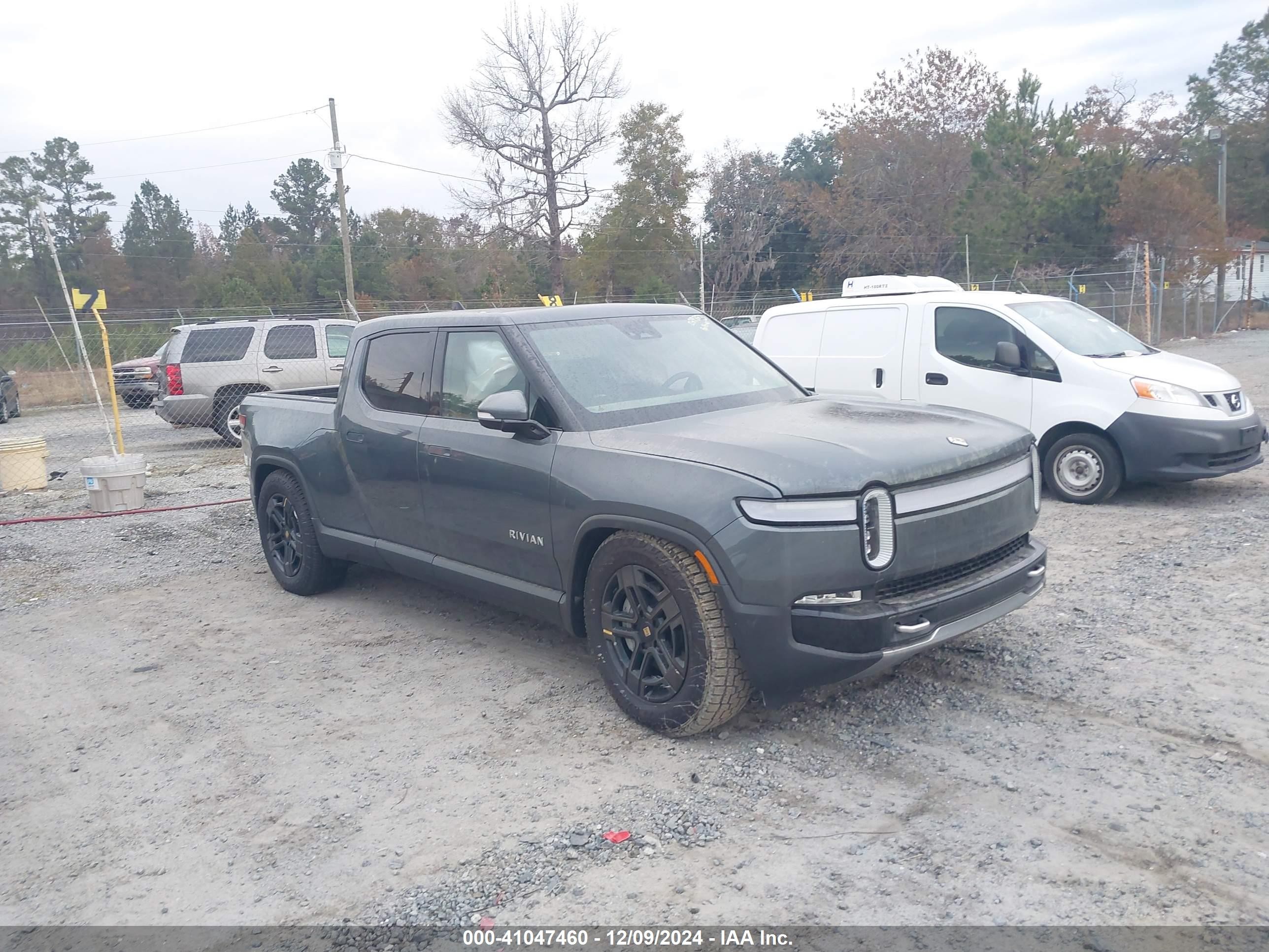 2023 Rivian R1T Adventure, VIN 7FCTGBAA7PN029823 — Rollover