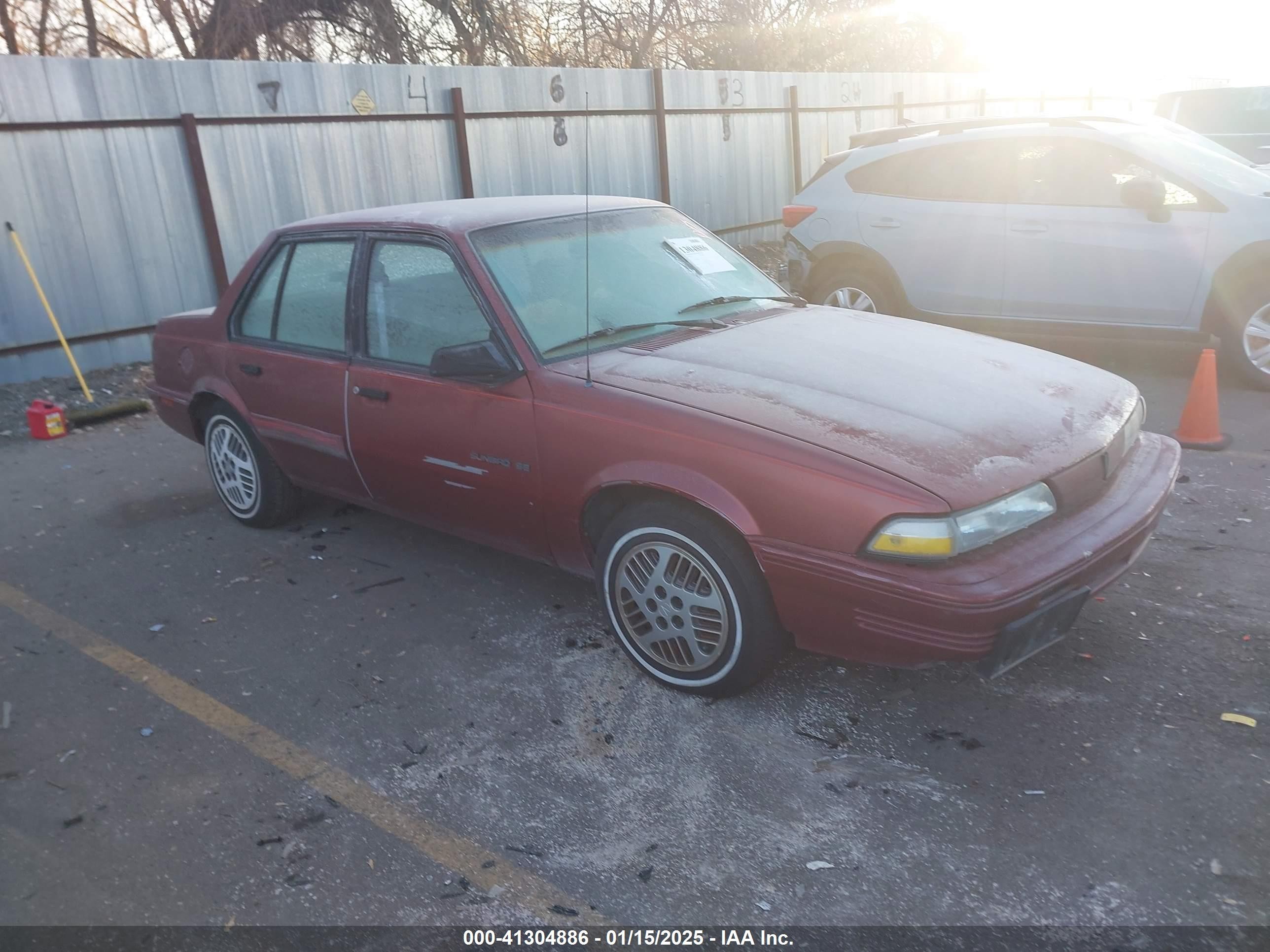 1992 Pontiac Sunbird LE, VIN 1G2JB54HXN7529633 — Normal wear
