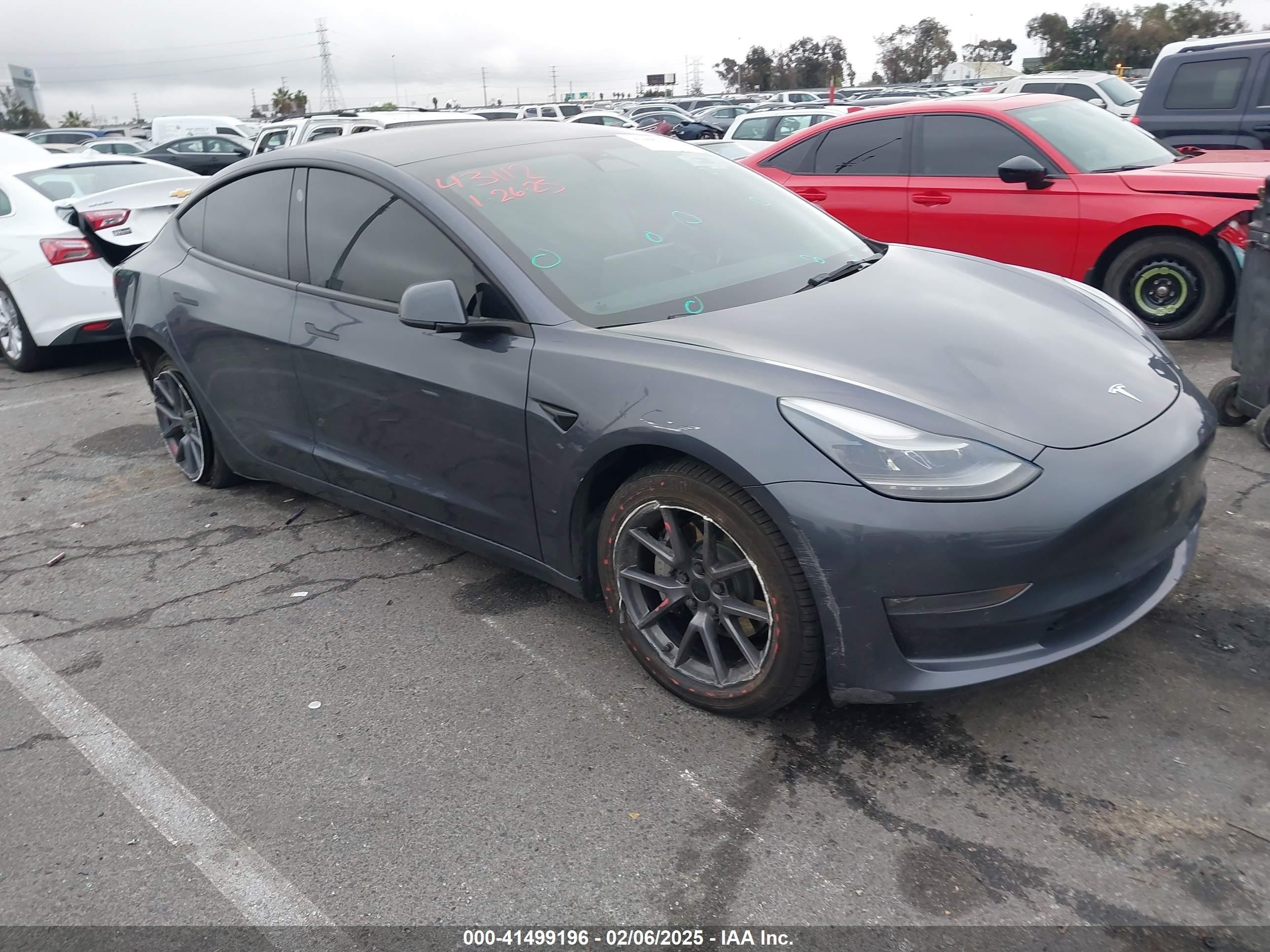 2022 Tesla Model 3 Long Range, VIN 5YJ3E1EB4NF255905 — Rear end