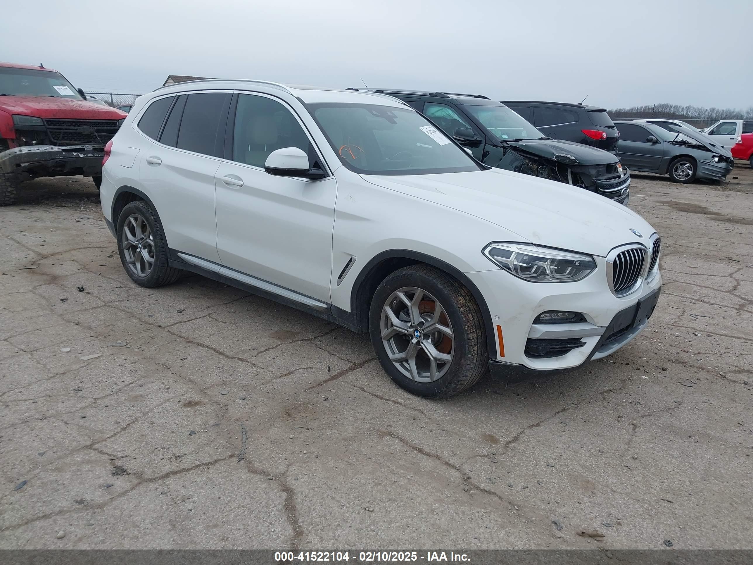2021 BMW X3 xDrive30e, VIN 5UXTS1C05M9E27461 — Front end