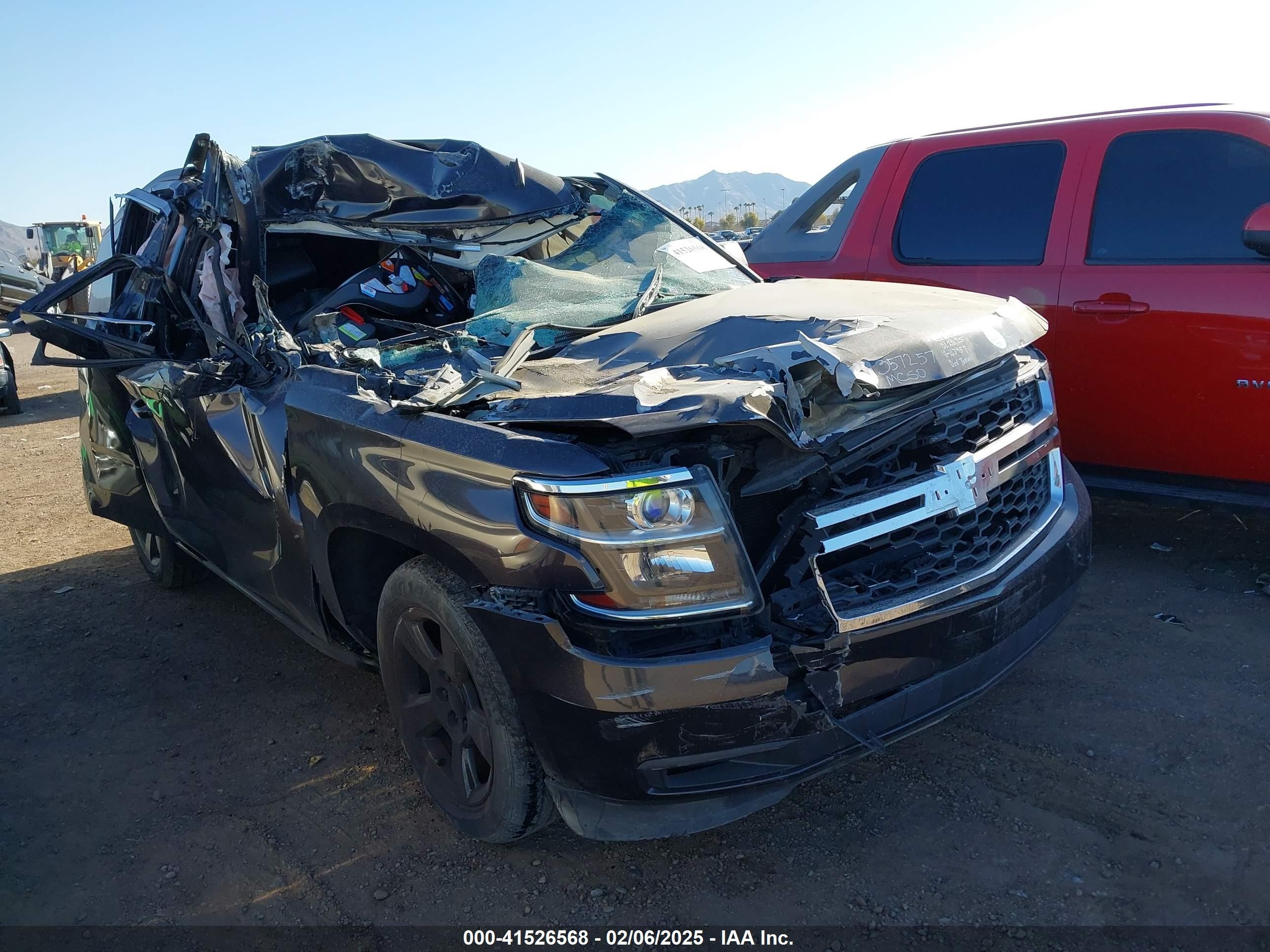 2015 Chevrolet Tahoe LT, VIN 1GNSCBKC0FR167957 — Rollover