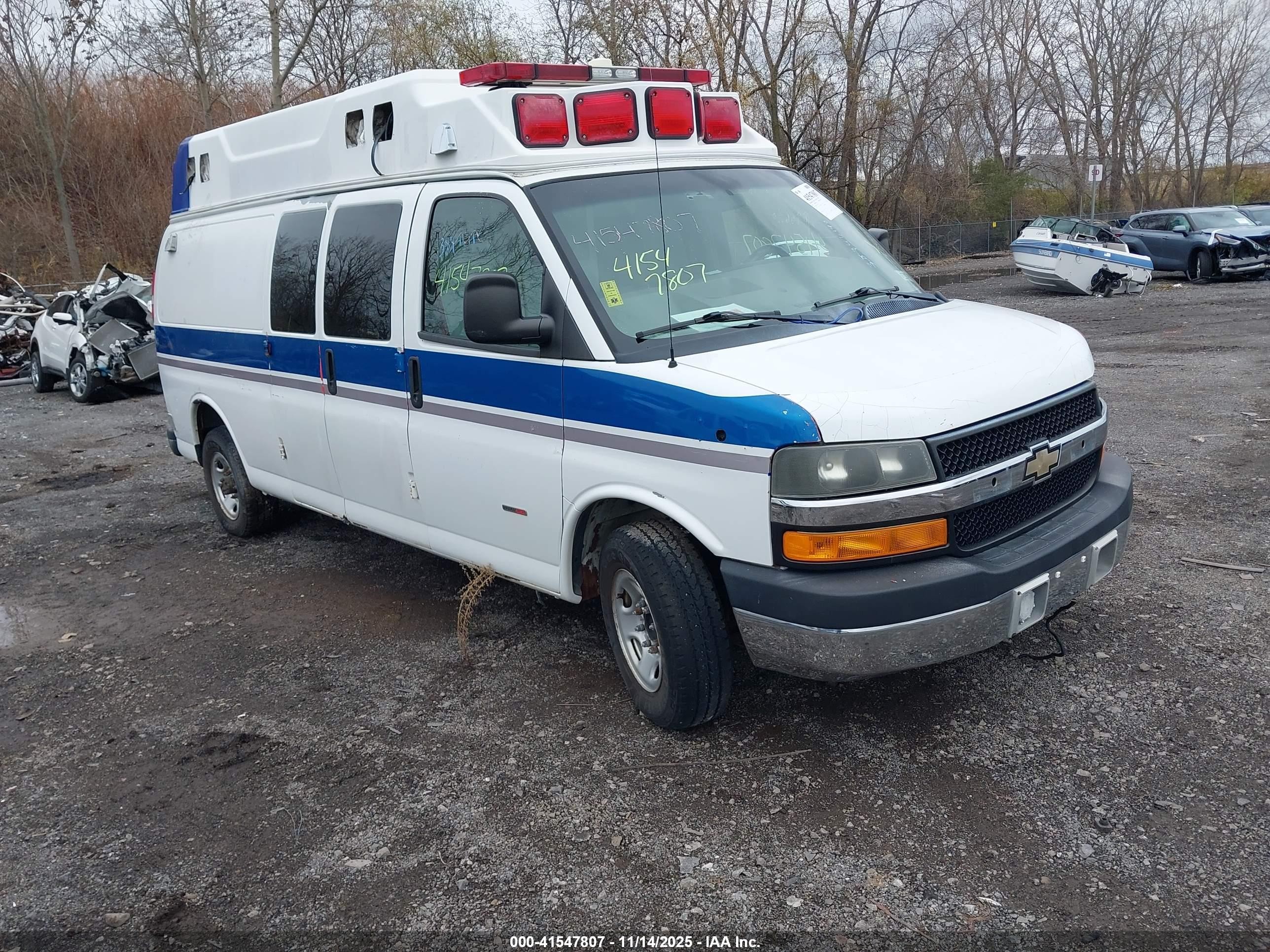 2012 Chevrolet Express 3500, VIN 1GBZGUCLXC1128751 — Side