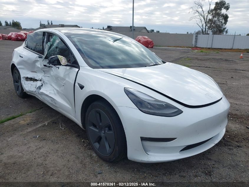 2022 Tesla Model 3 Long Range, VIN 5YJ3E1EB5NF364678 — Side