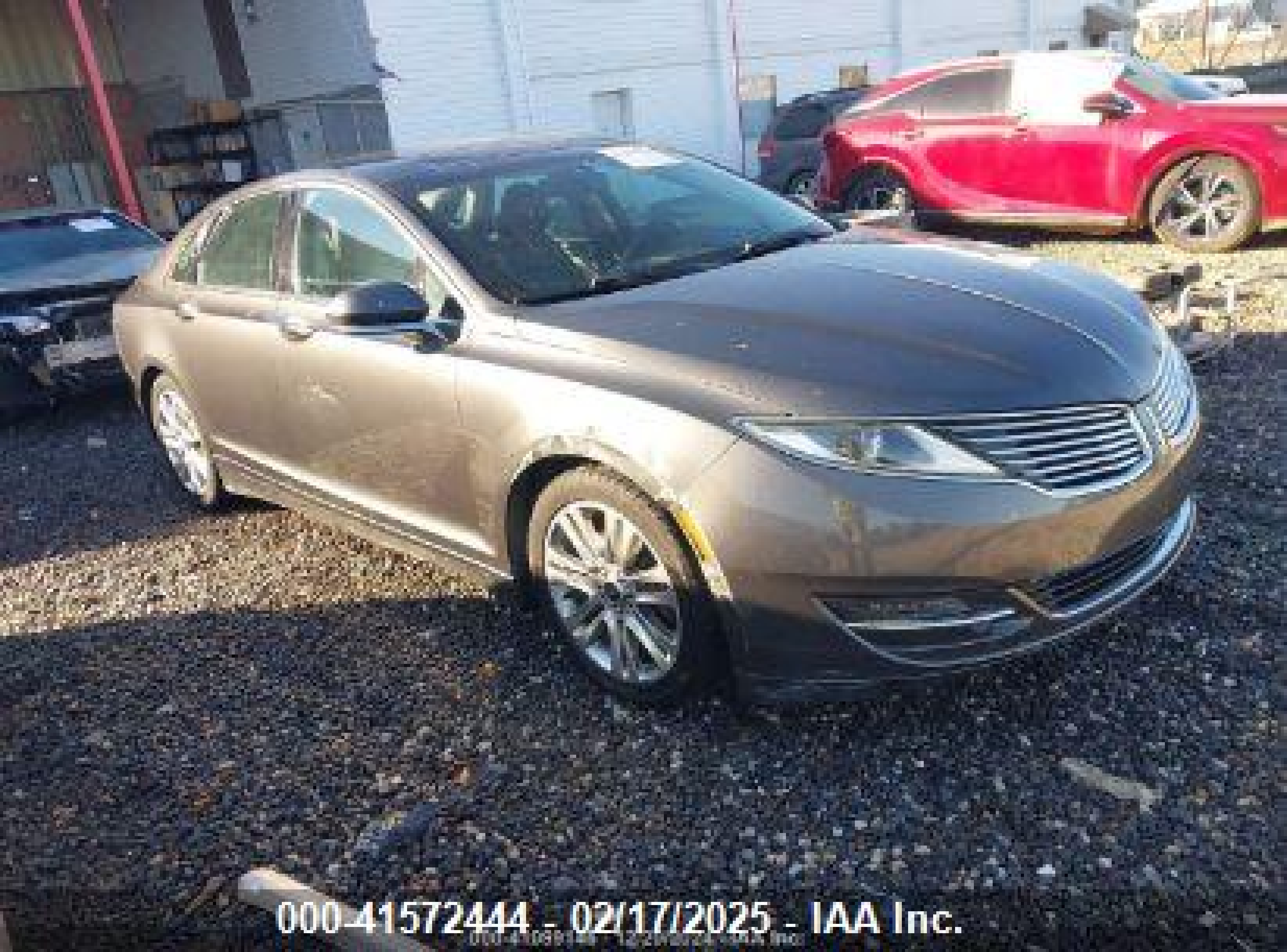 2015 Lincoln MKZ, VIN 3LN6L2J90FR623035 — Storm