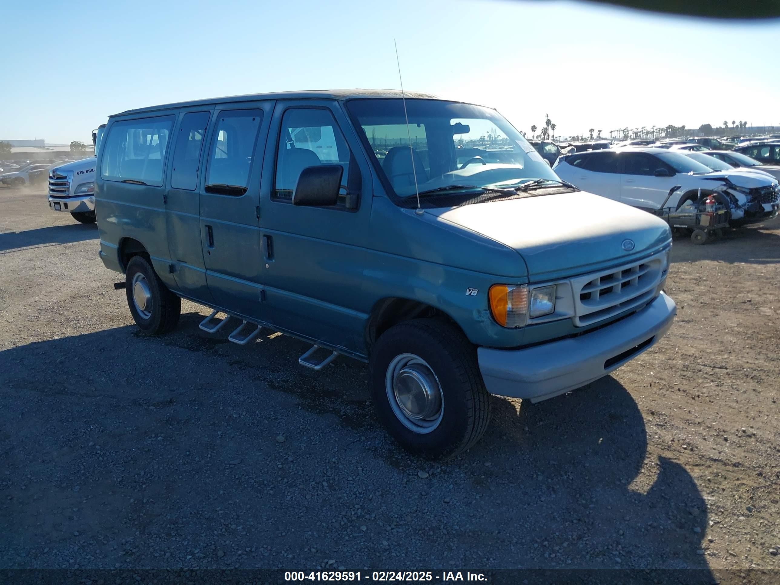 1998 Ford Econoline Wagon XL, VIN 1FBNE31L2WHA61351 — Theft recovery