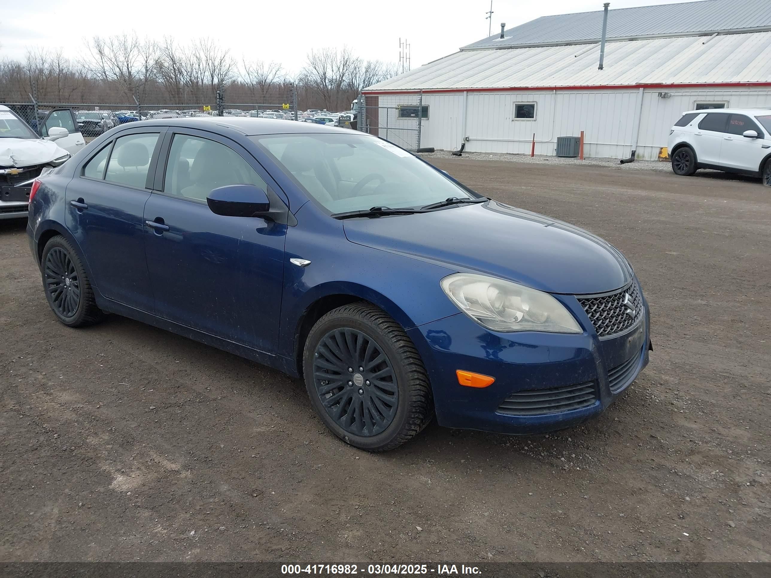 2012 Suzuki Kizashi SE, VIN JS2RE9A31C6100430 — Rear end