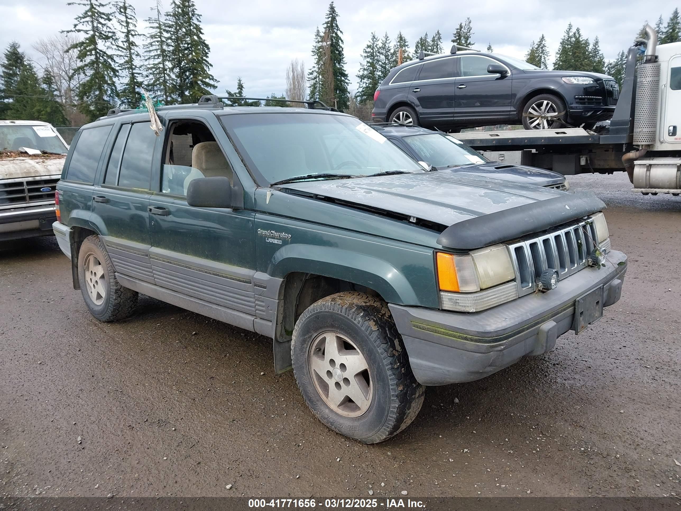 1994 Jeep Grand Cherokee Laredo, VIN 1J4GZ58S2RC119178 — Side