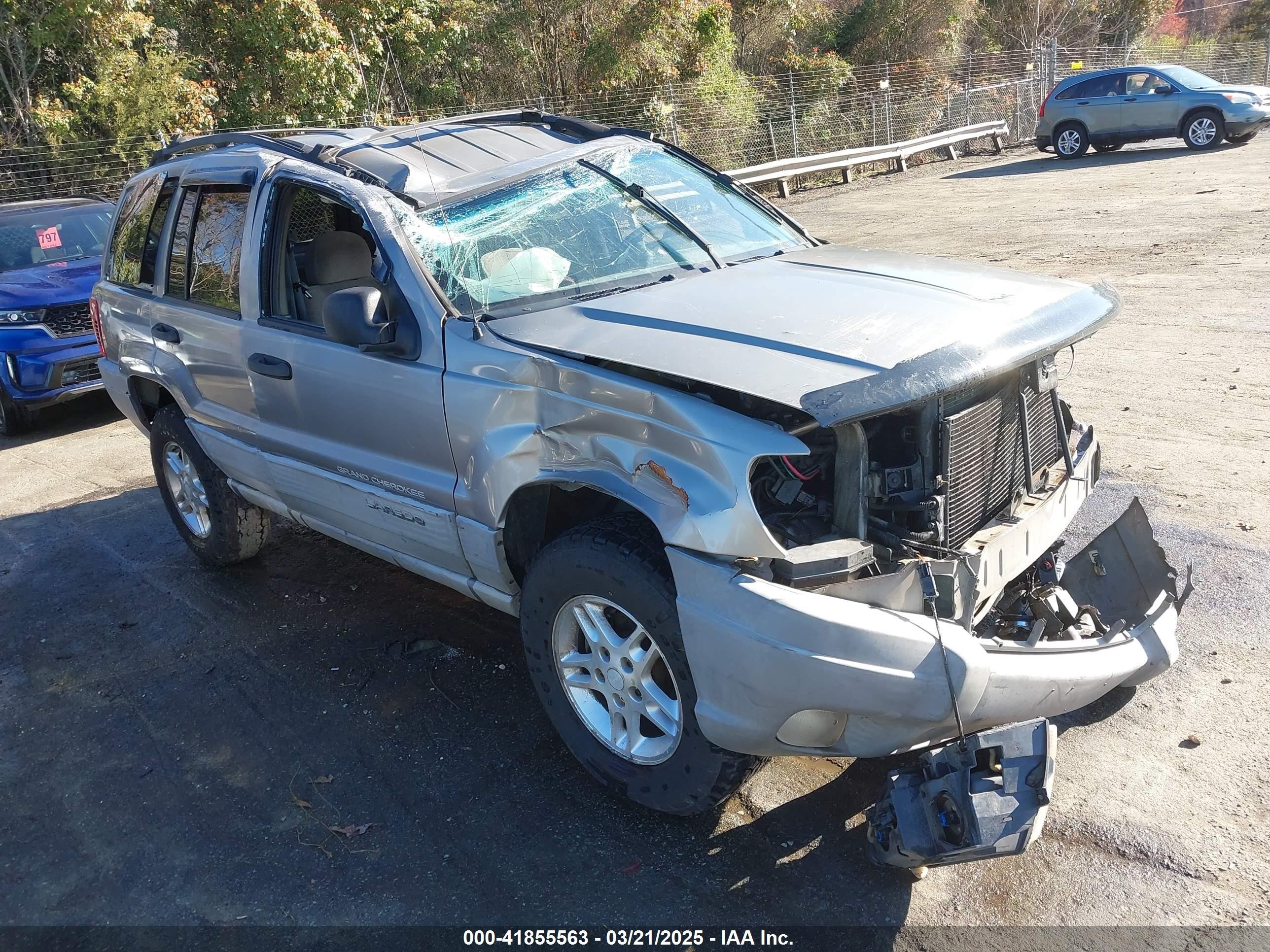 1999 Jeep Grand Cherokee Laredo, VIN 1J4GW58S0XC594835 — Rollover