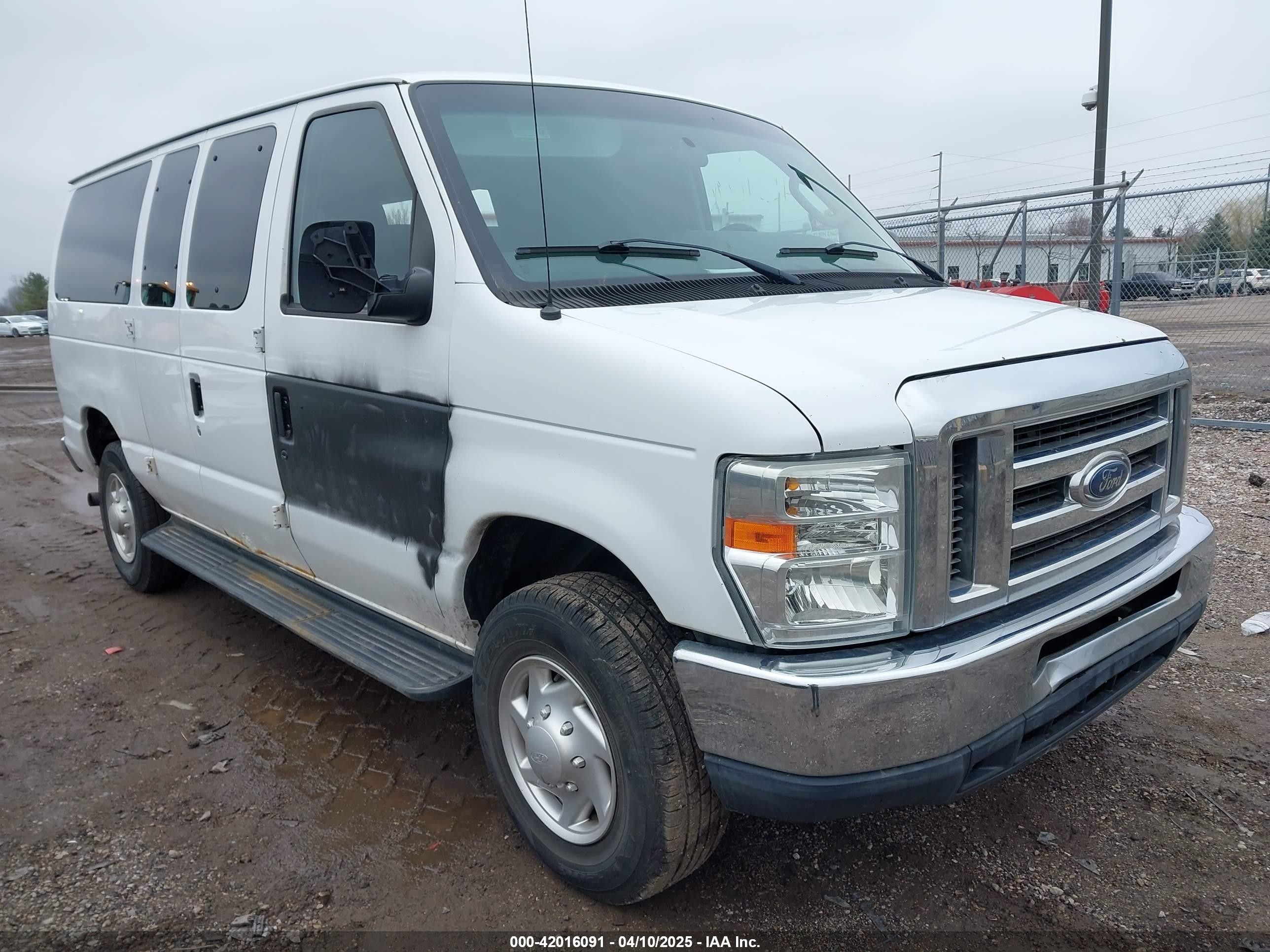 2011 Ford E-350, VIN 1FDNE3BL2BDB21572 — Theft recovery