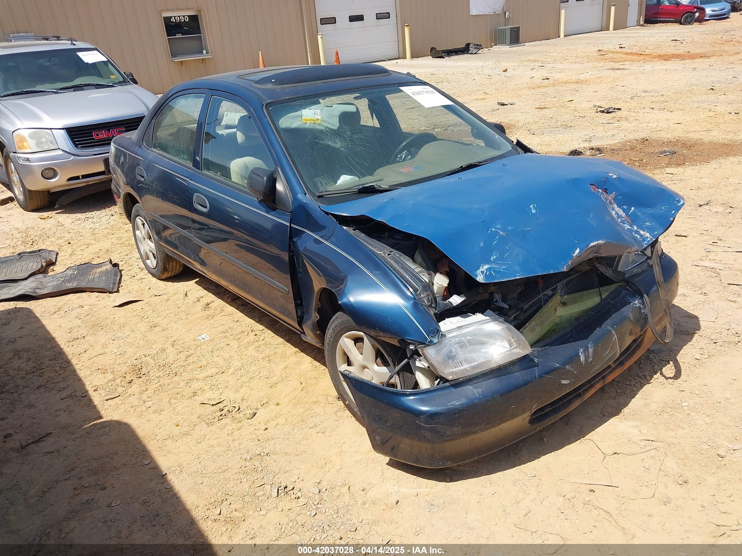 1998 Mazda Protege DX, VIN JM1BC1410W0231286 — Front end