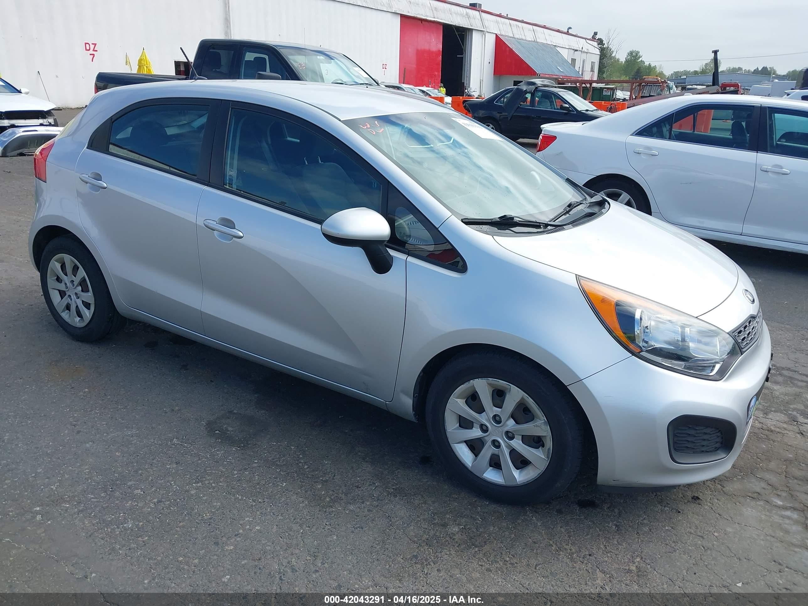2014 Kia Rio LX, VIN KNADM5A38E6410705 — Фото с аукциона