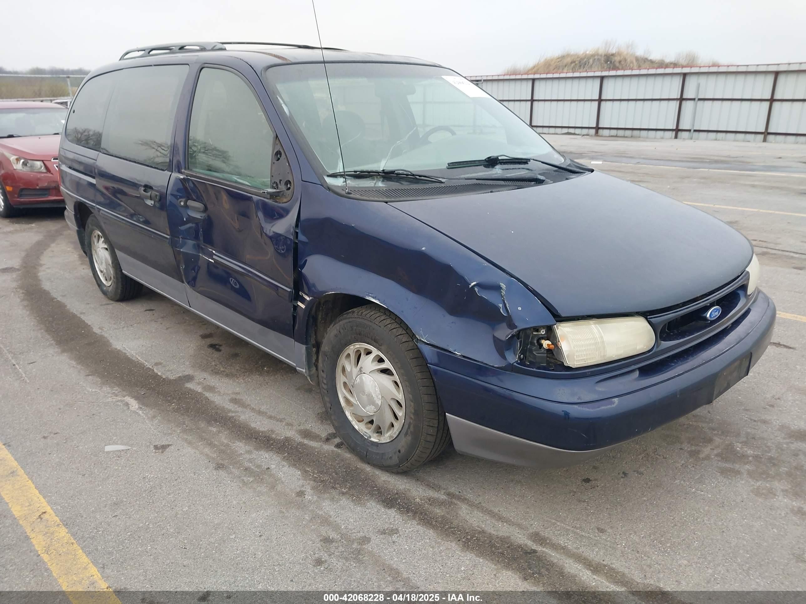 1995 Ford Windstar GL, VIN 2FMDA5149SBC55420 — Side