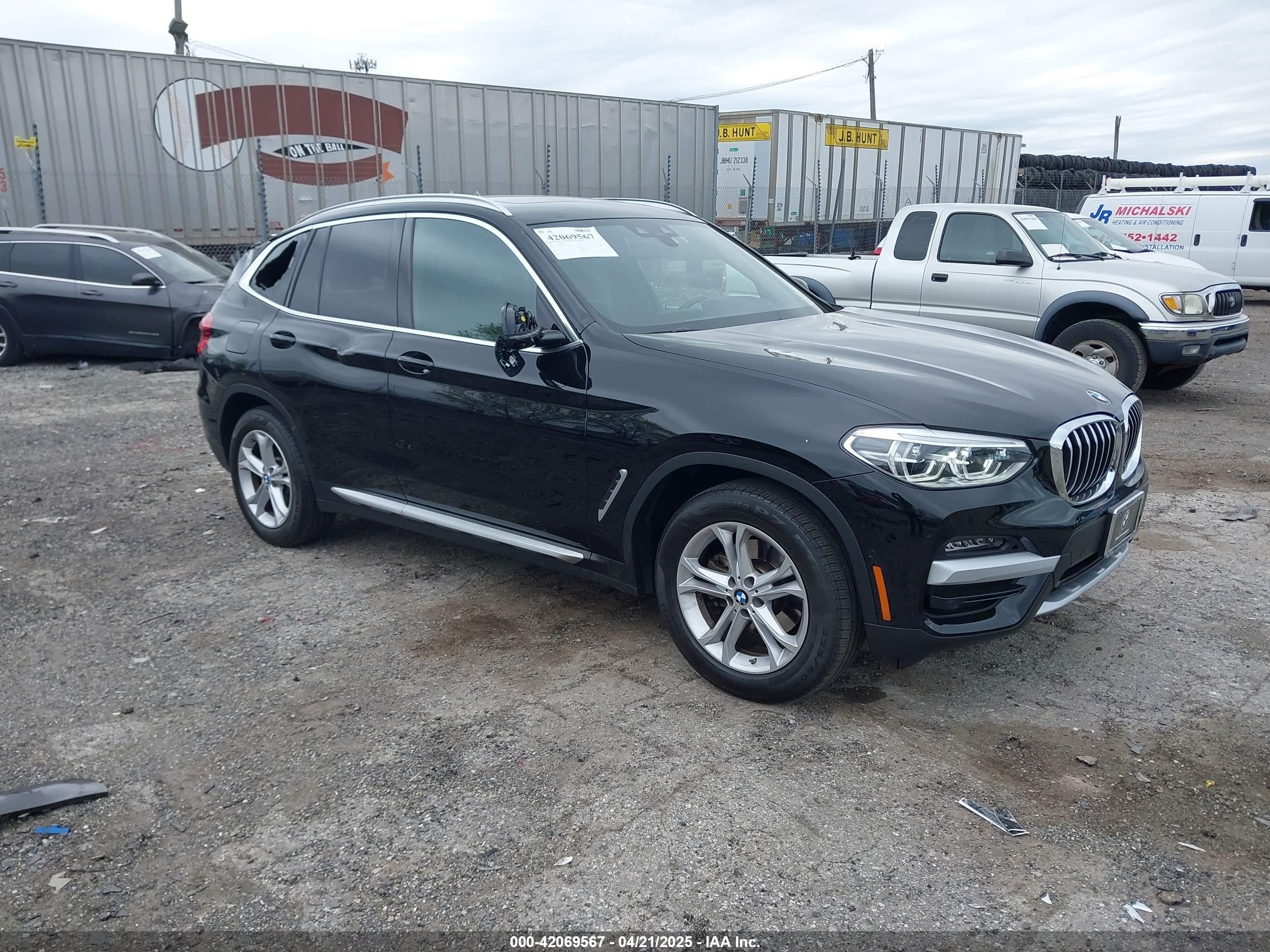 2021 BMW X3 xDrive30i, VIN 5UXTY5C04M9F93699 — Rear end