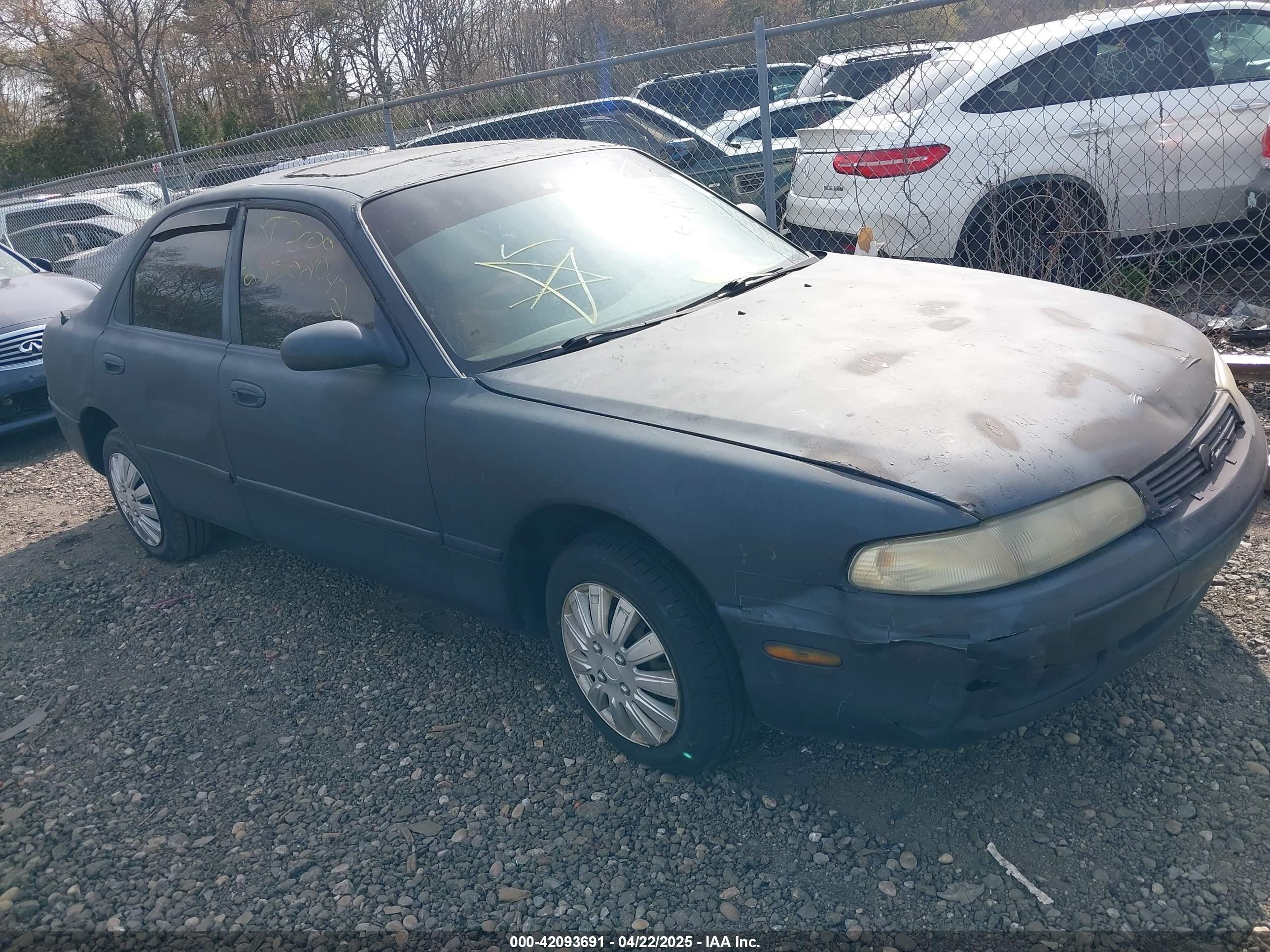 1995 Mazda 626 DX, VIN 1YVGE22C6S5306199 — По всему кузову