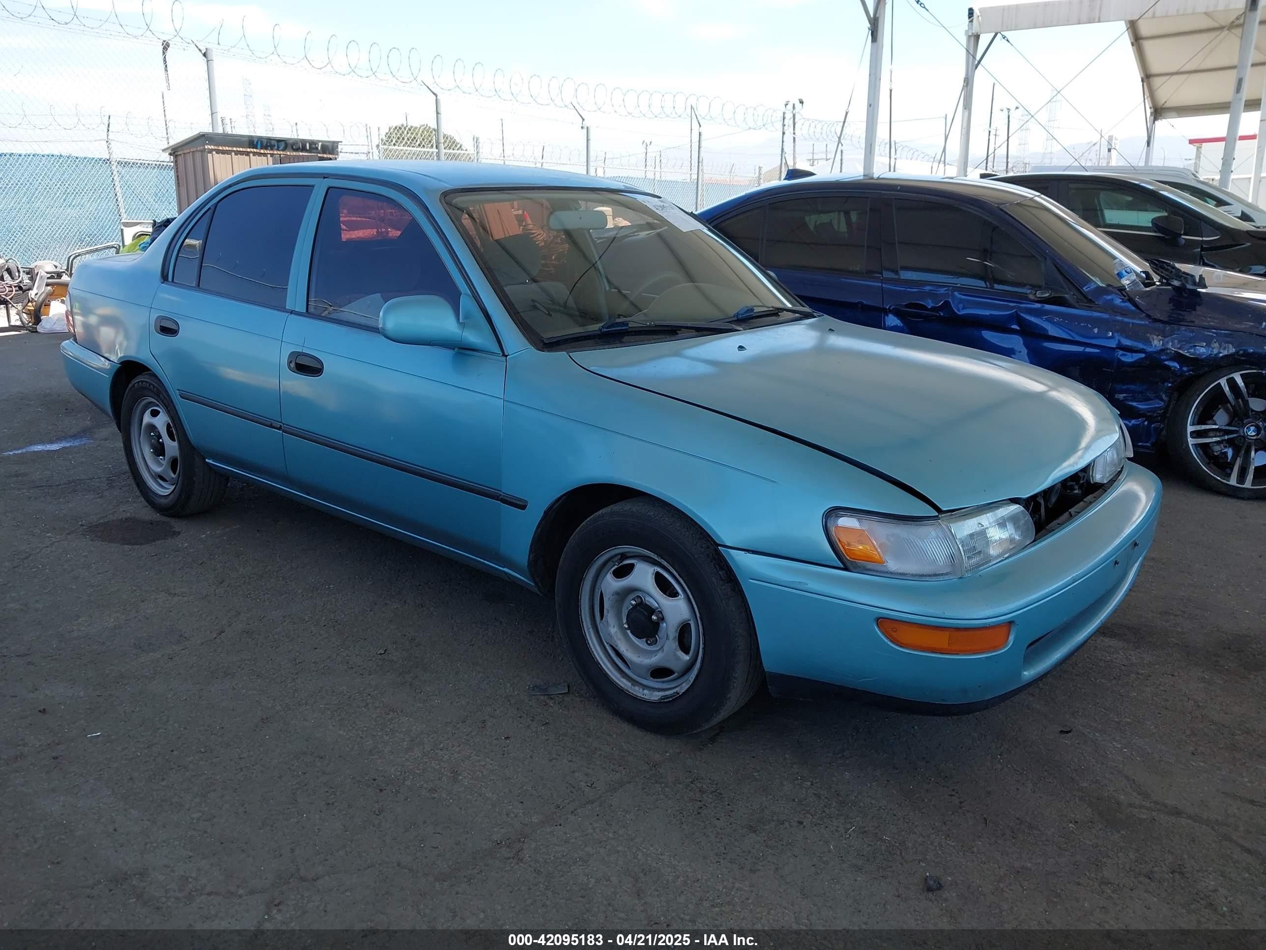 1996 Toyota Corolla DX, VIN 1NXBB02E1TZ450745 — Front end