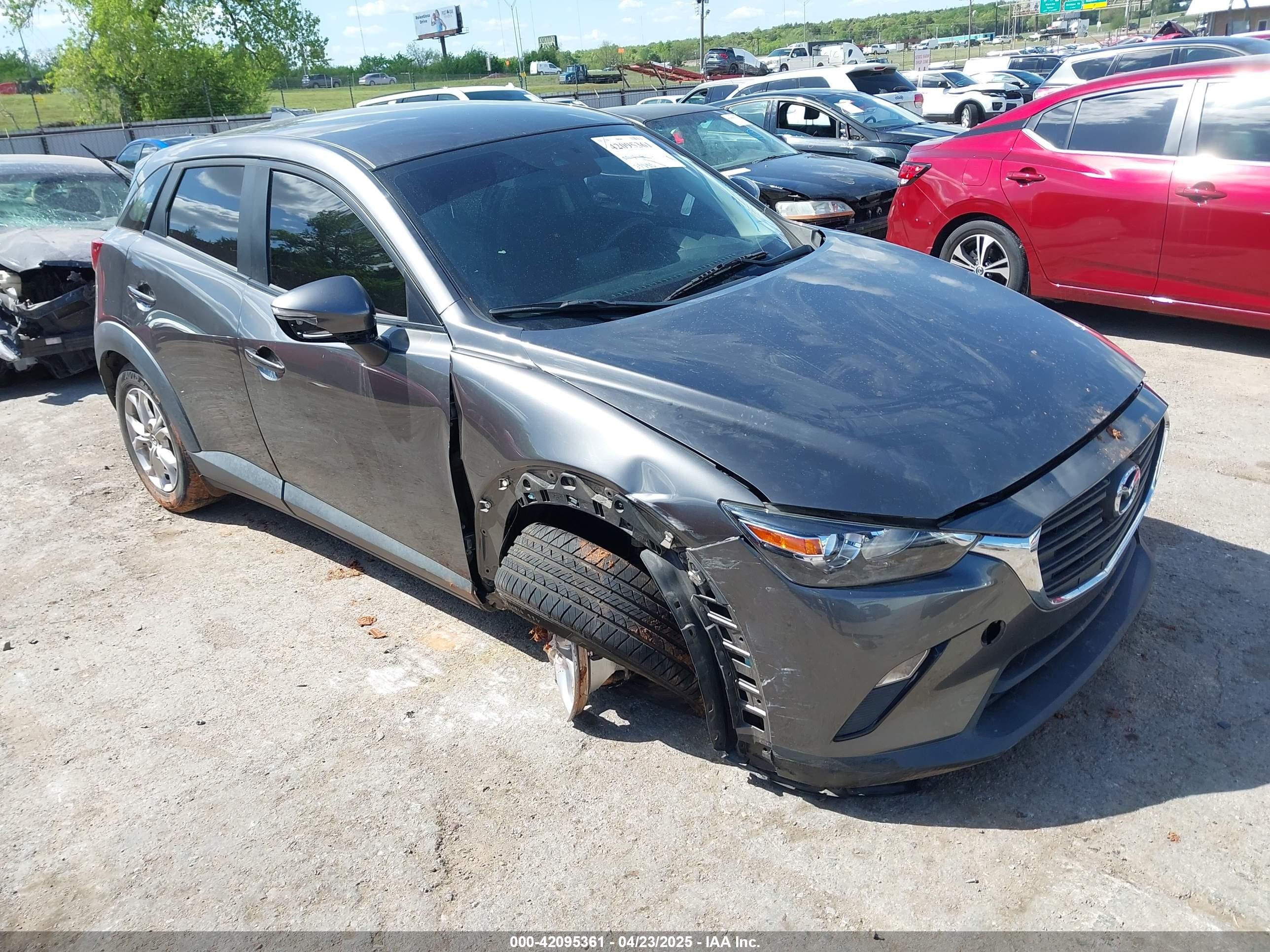 2019 Mazda CX-3 Sport, VIN JM1DKDB72K1450341 — Side