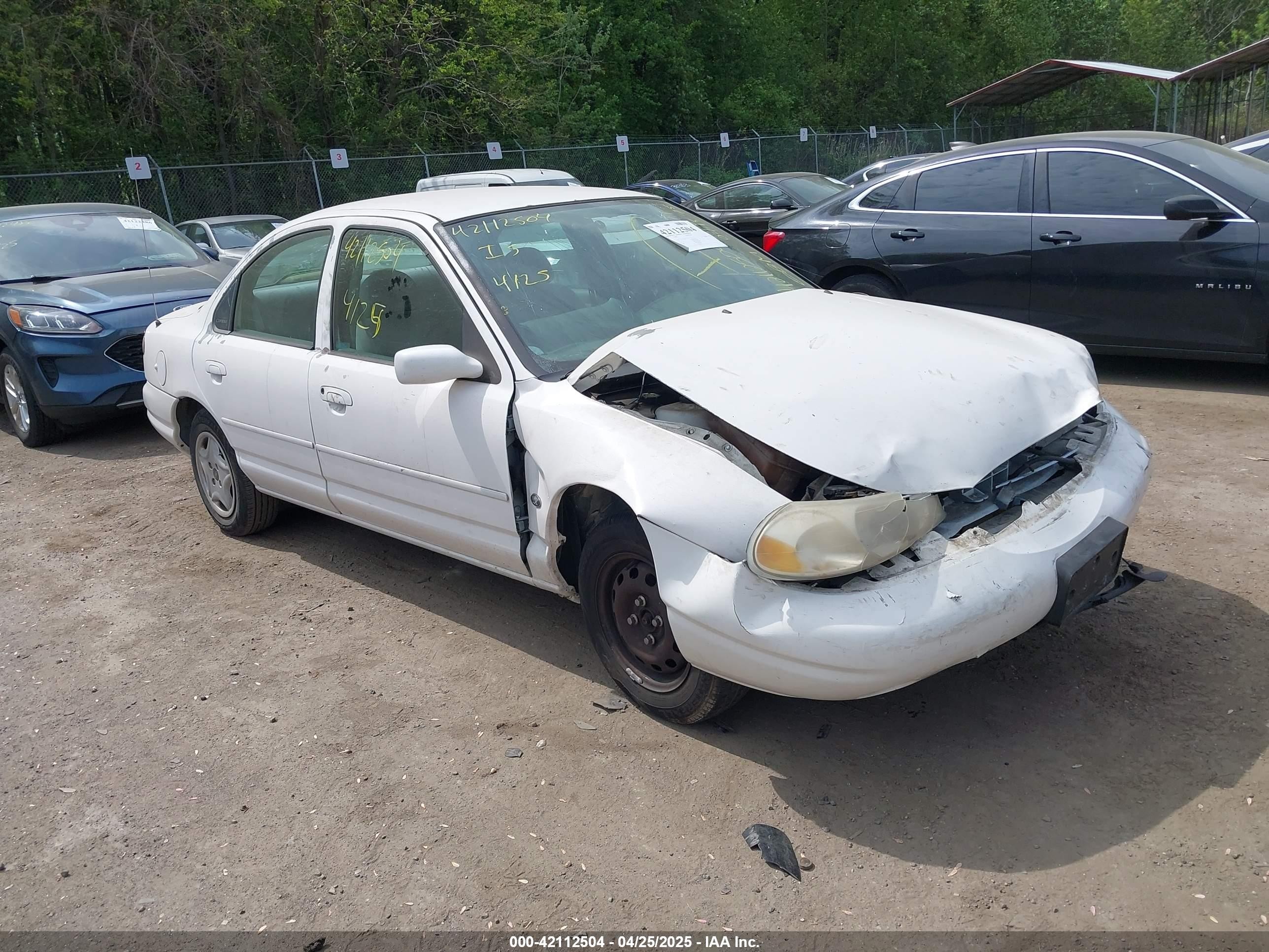 1998 Ford Contour LX, VIN 1FAFP6537WK249099 — Front end