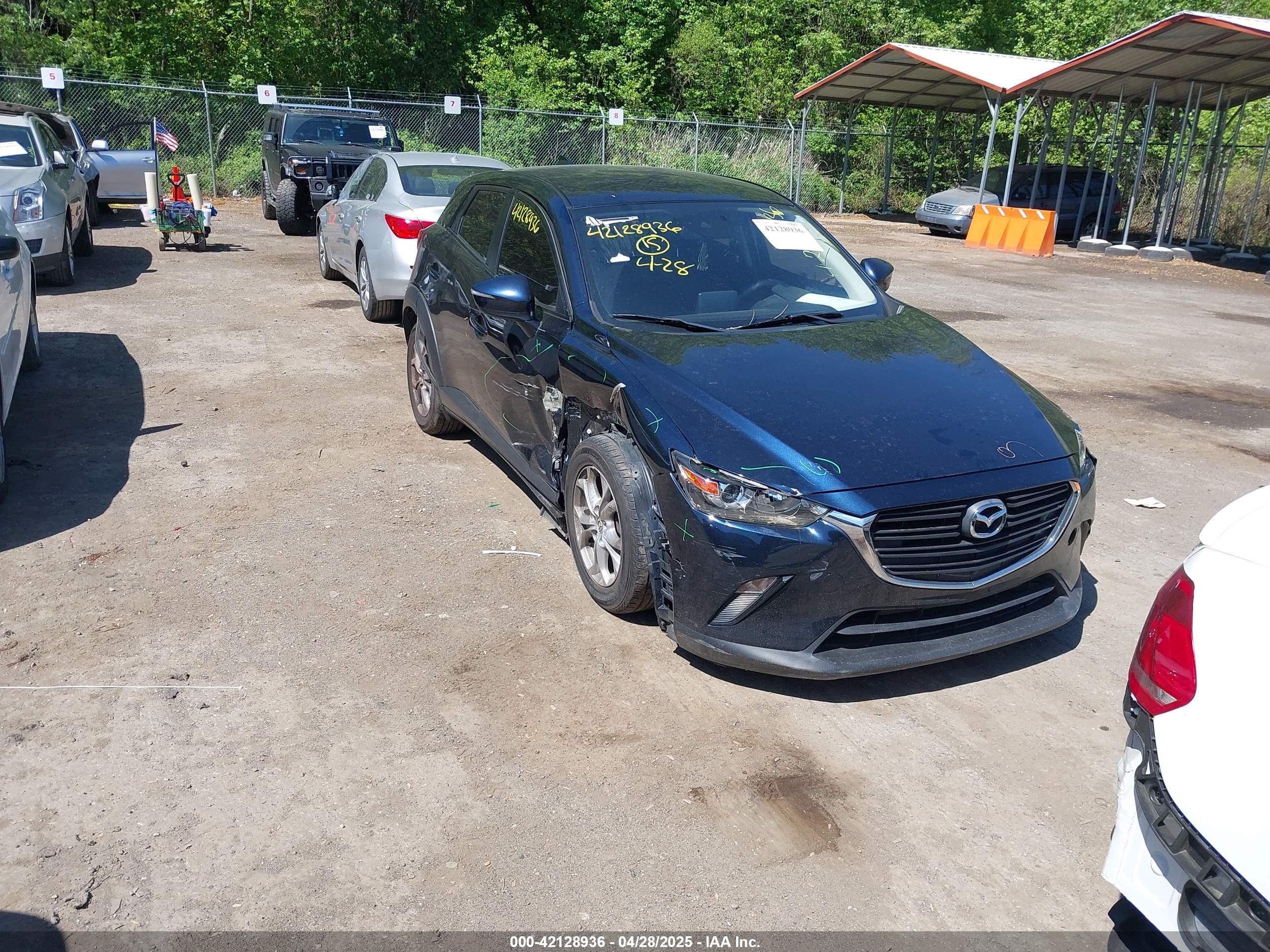 2019 Mazda CX-3 Sport, VIN JM1DKFB70K1451421 — Side