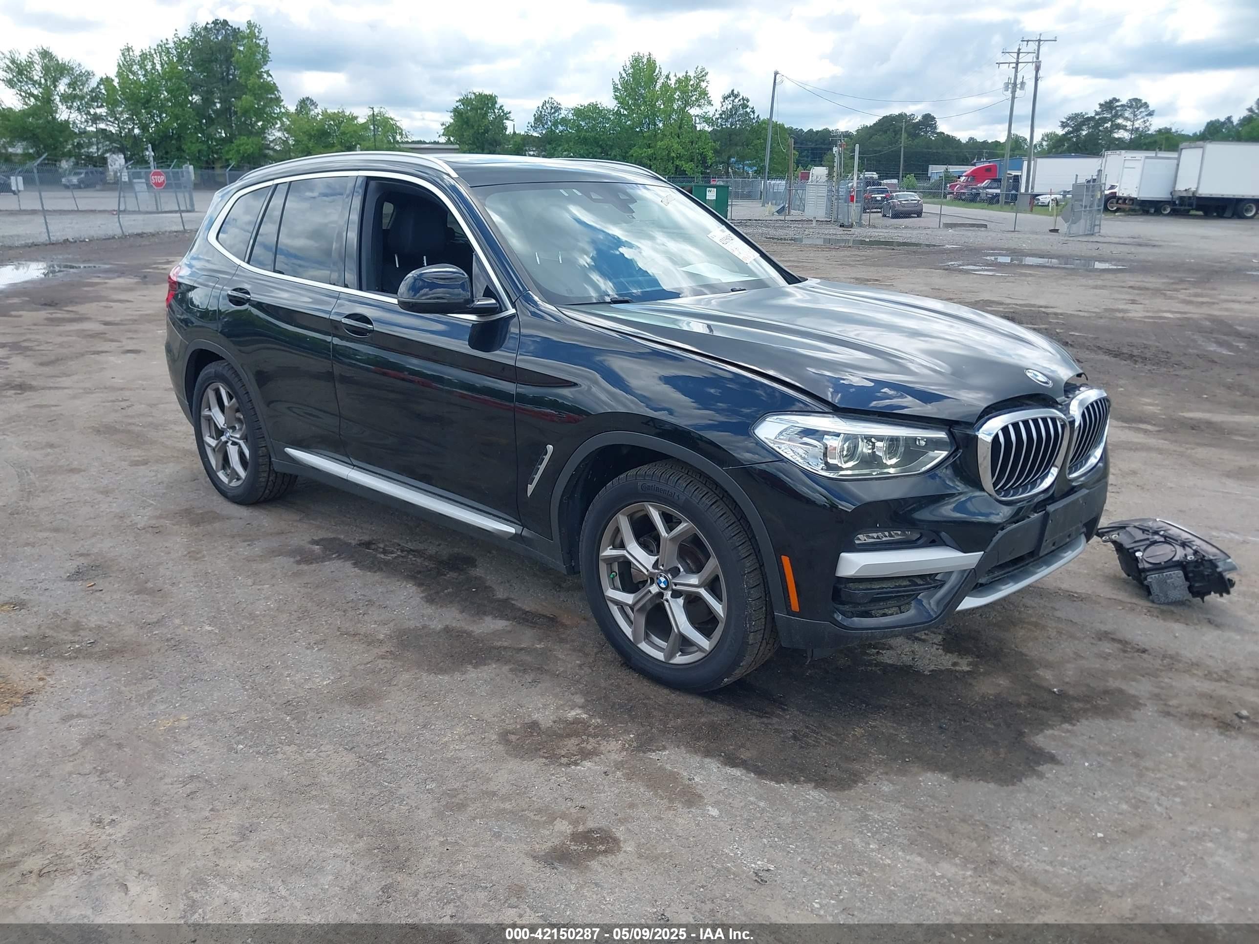 2021 BMW X3 xDrive30i, VIN 5UXTY5C0XM9F11085 — Side