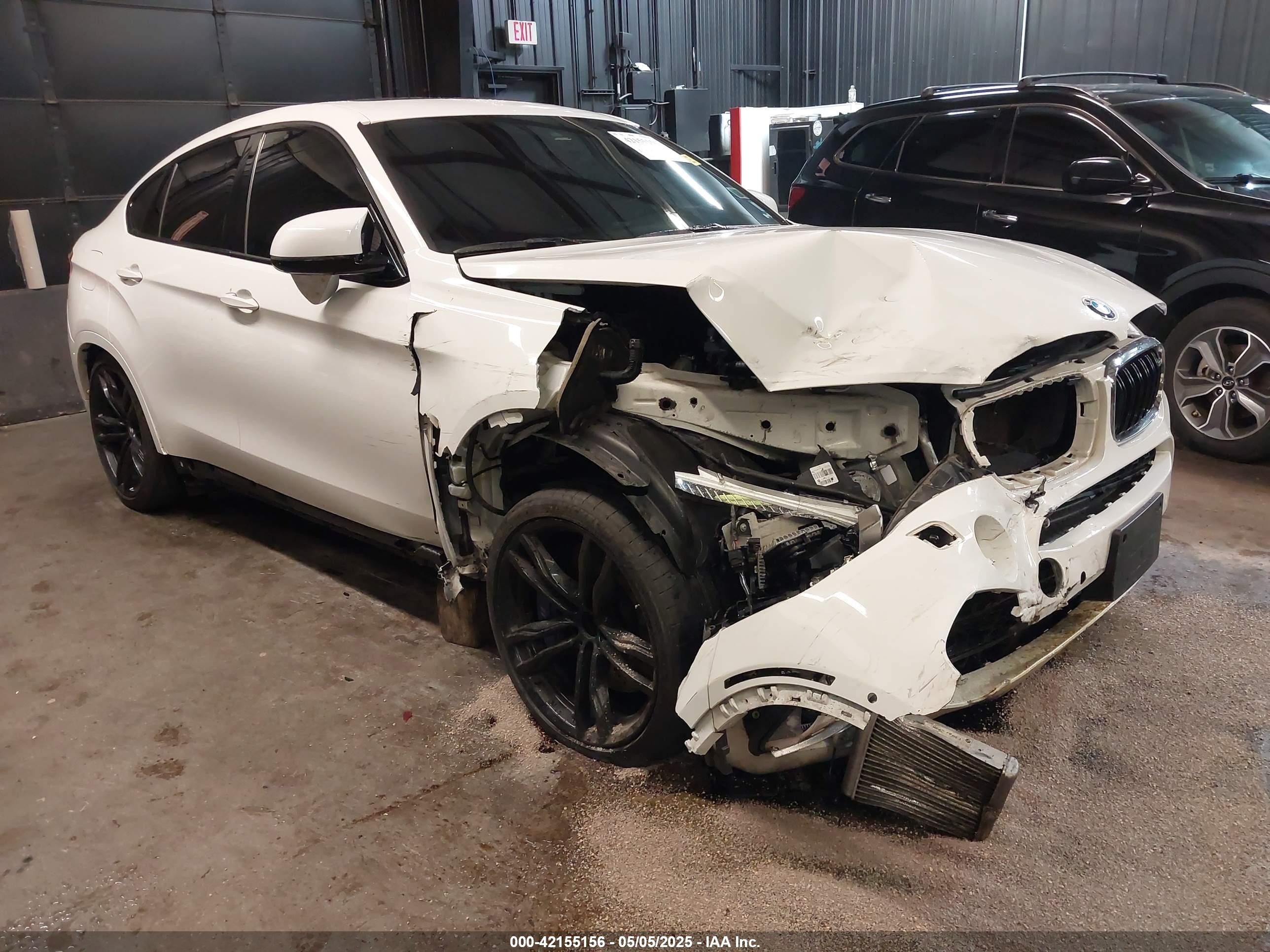 2019 BMW X6 M, VIN 5YMKW8C54K0Y75055 — Side