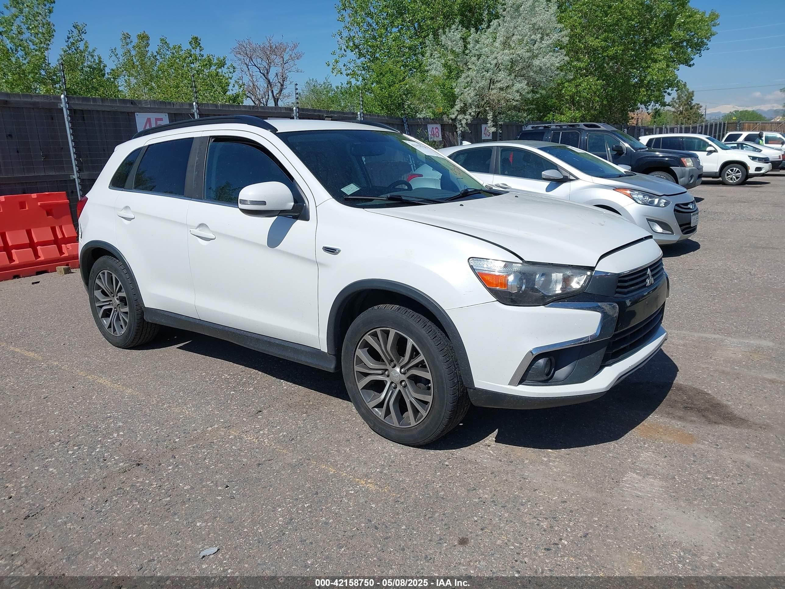 2016 Mitsubishi Outlander SEL, VIN JA4AR4AW7GZ052665 — Rear end