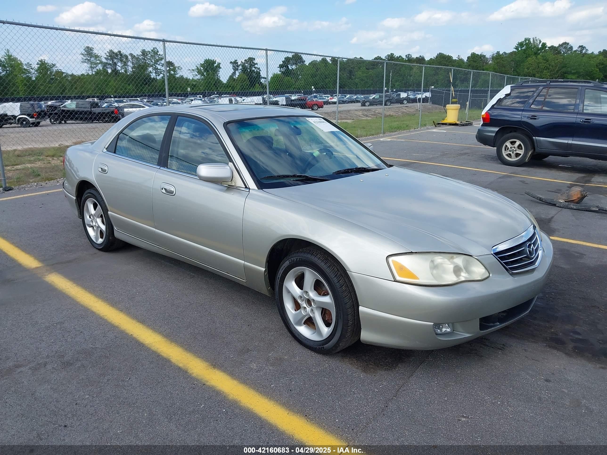 2002 Mazda Millenia P, VIN JM1TA221721722364 — Rear end
