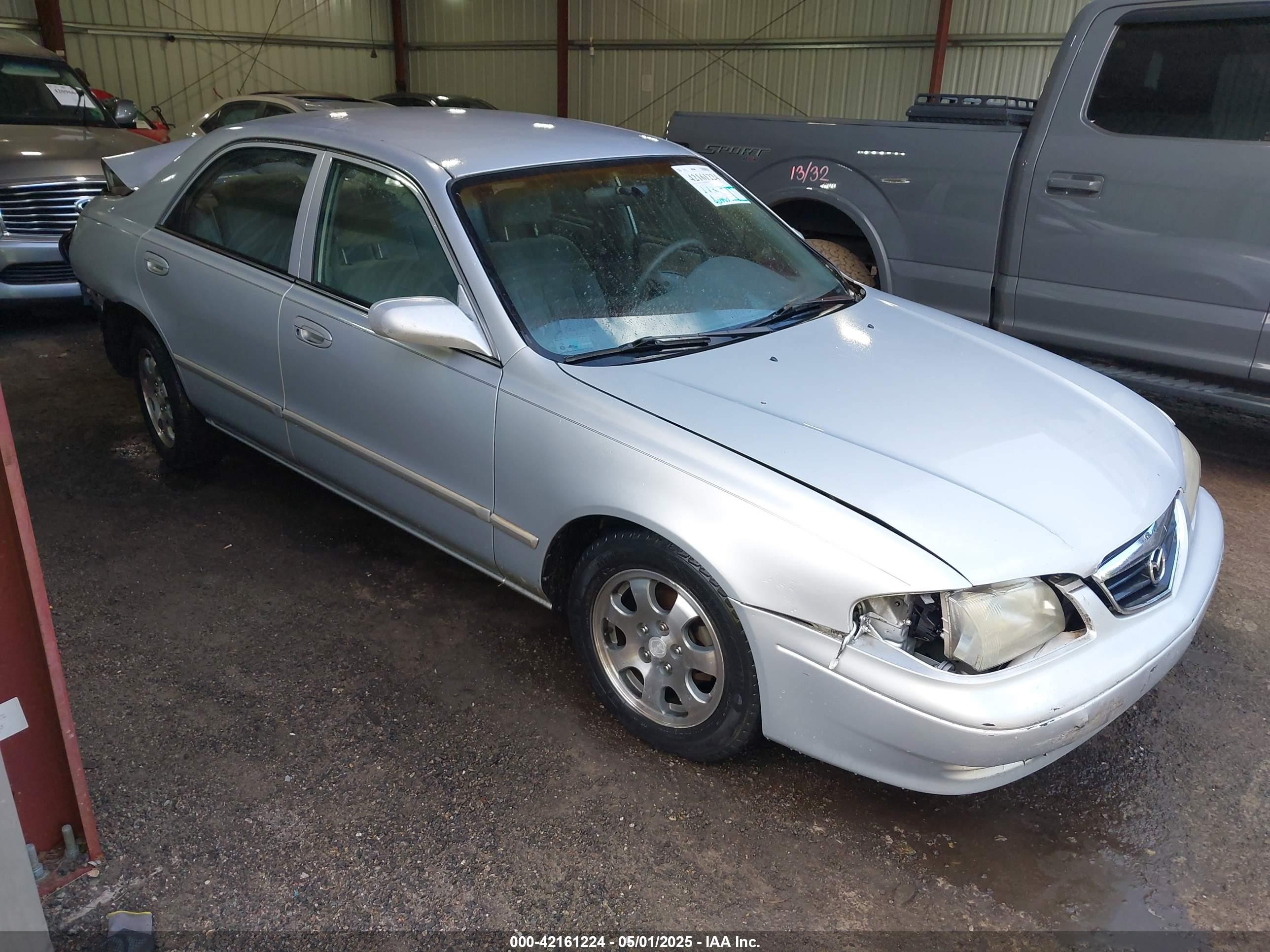 2002 Mazda 626 LX, VIN 1YVGF22C725302076 — Rear end