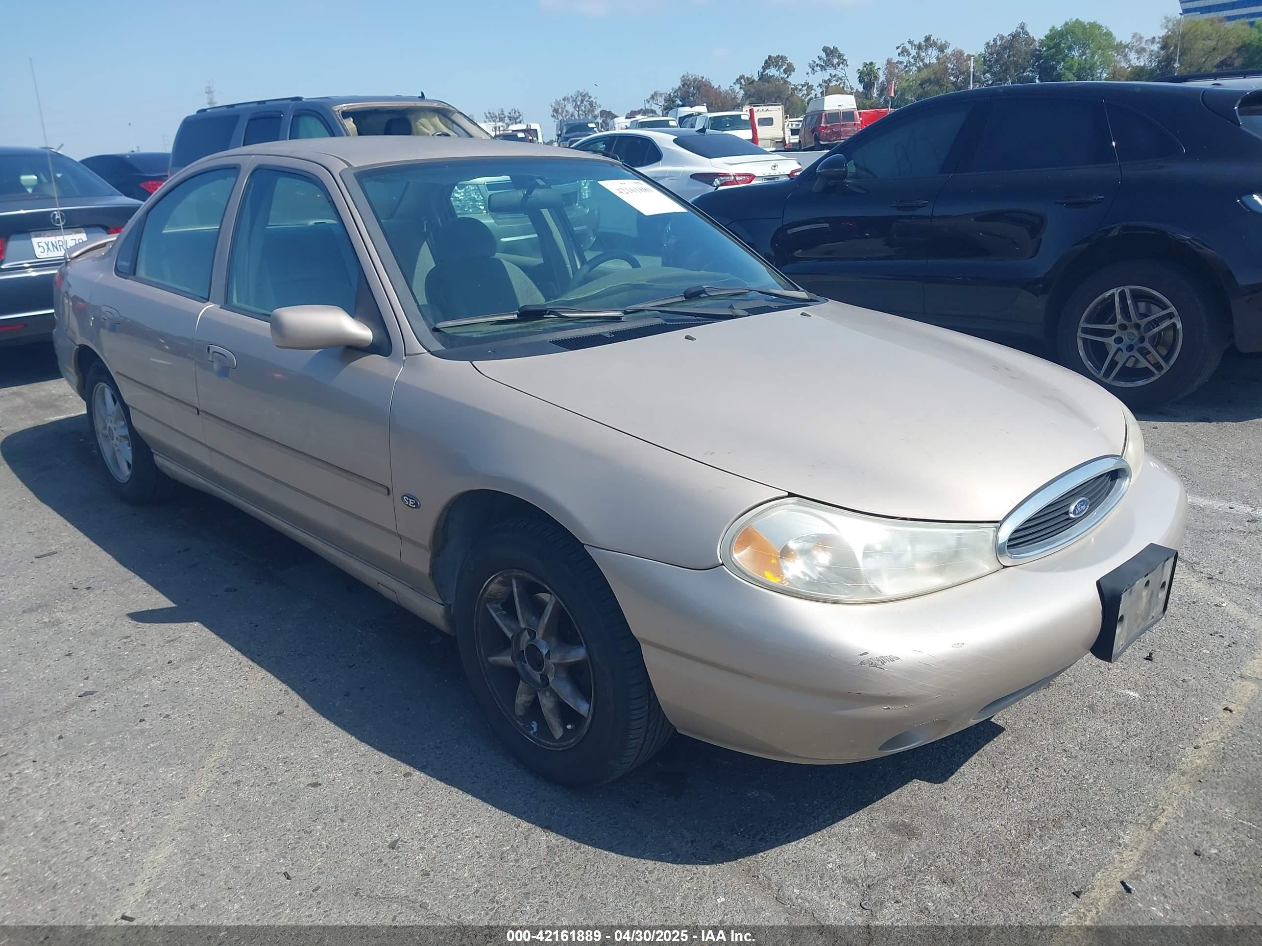1999 Ford Contour SE Fleet, VIN 3FAFP66L6XM102099 — Rear end