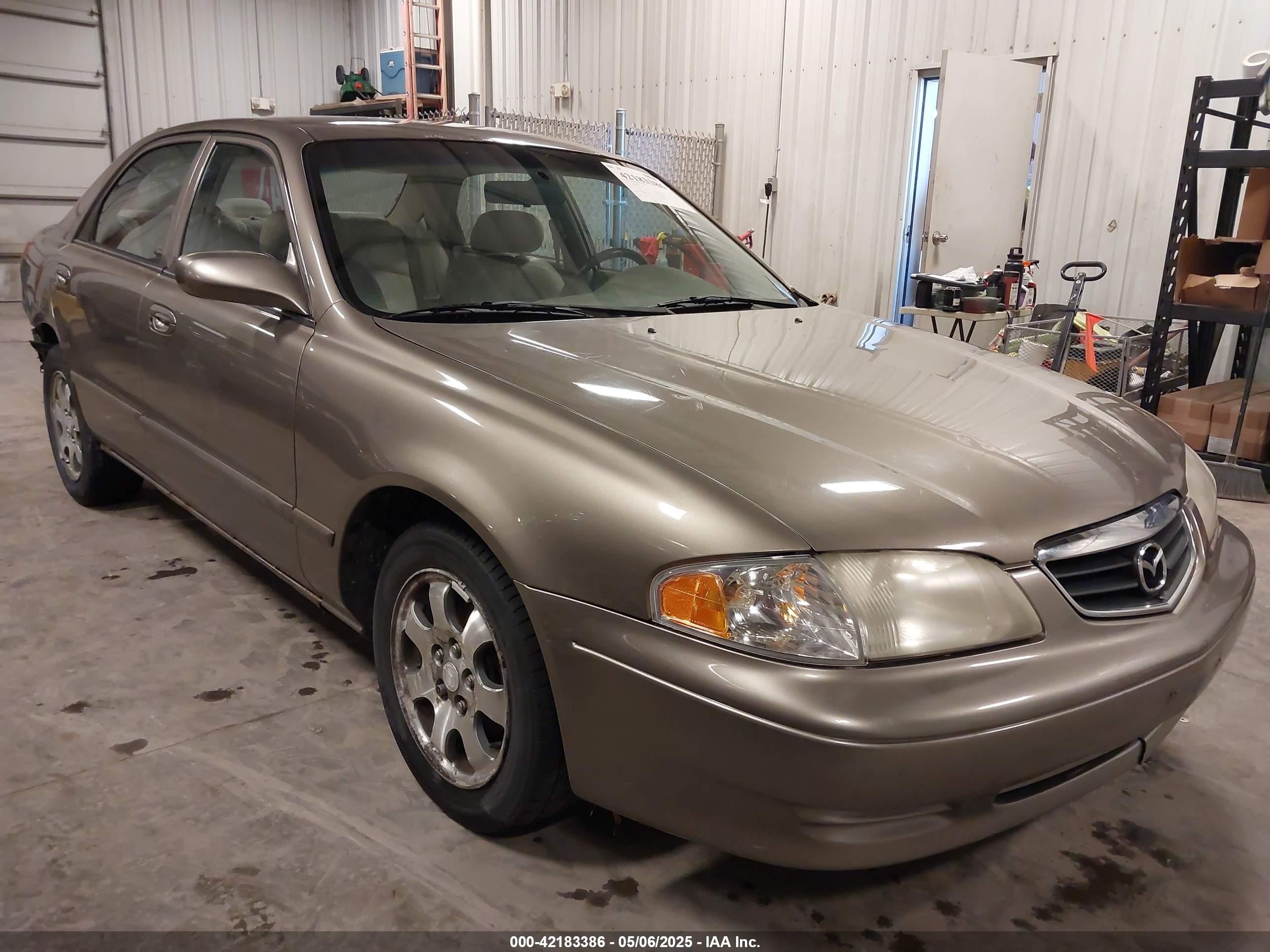 2000 Mazda 626 LX, VIN 1YVGF22C5Y5122894 — All over