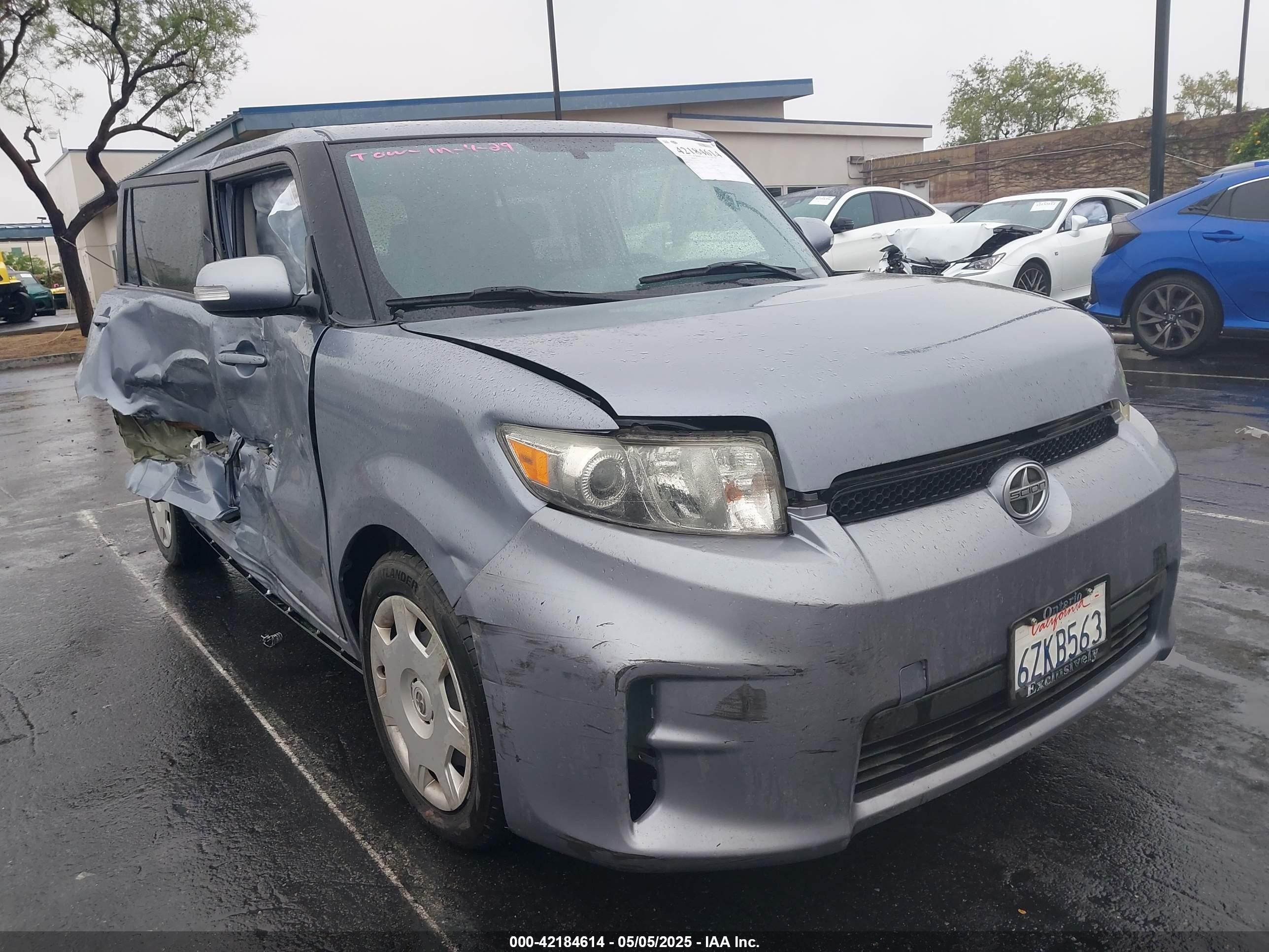 2012 Scion xB, VIN JTLZE4FE3CJ011774 — Side