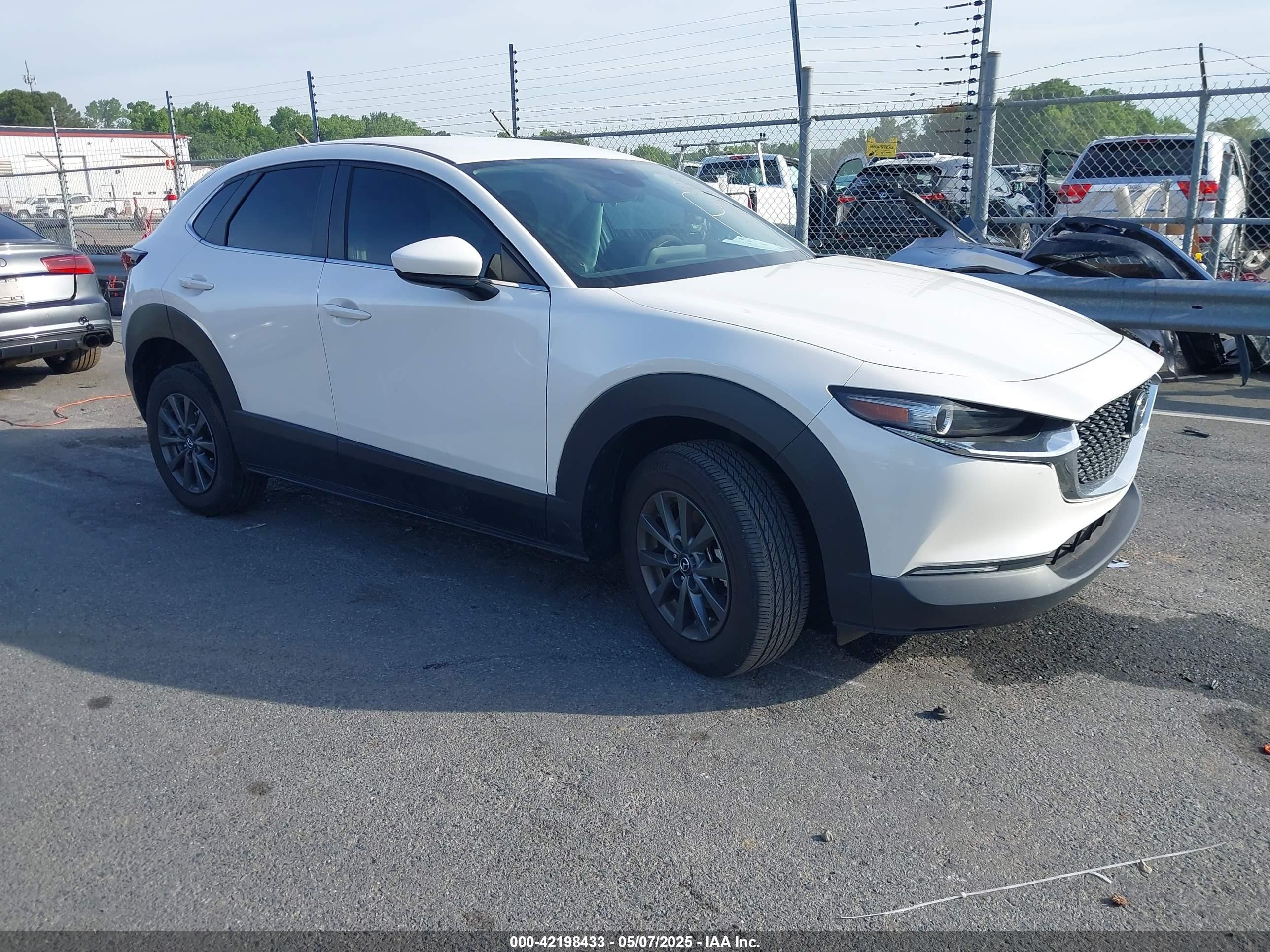 2023 Mazda CX-30 S, VIN 3MVDMBAM8PM545288 — Side