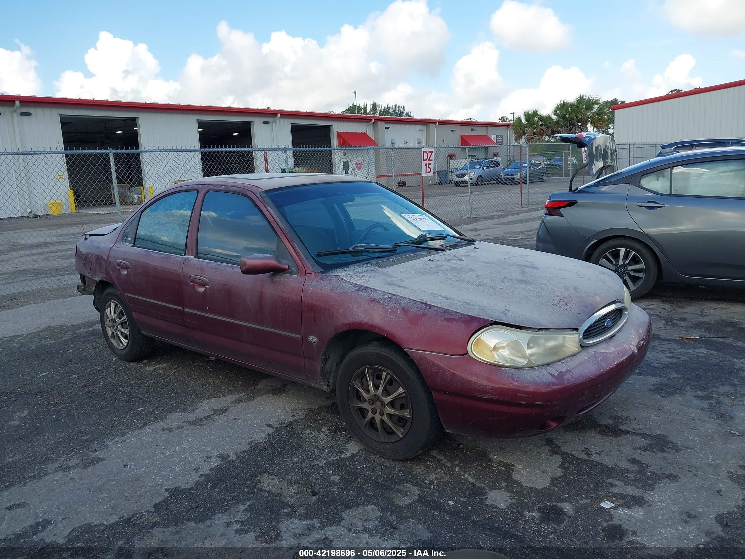 1999 Ford Contour SE, VIN 1FAFP6635XK169090 — Rear end