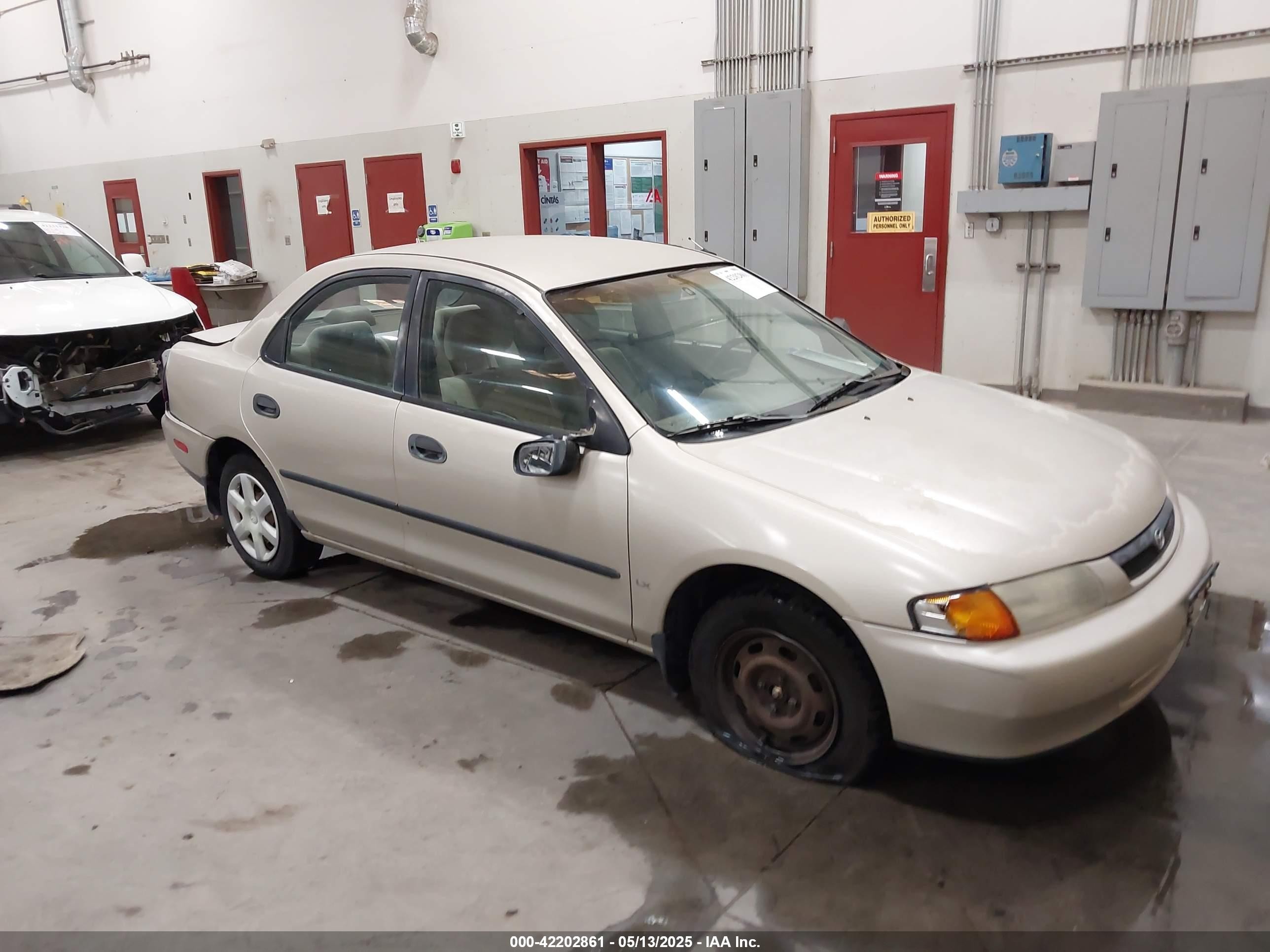 1998 Mazda Protege DX, VIN JM1BC1419W0171802 — Rear end
