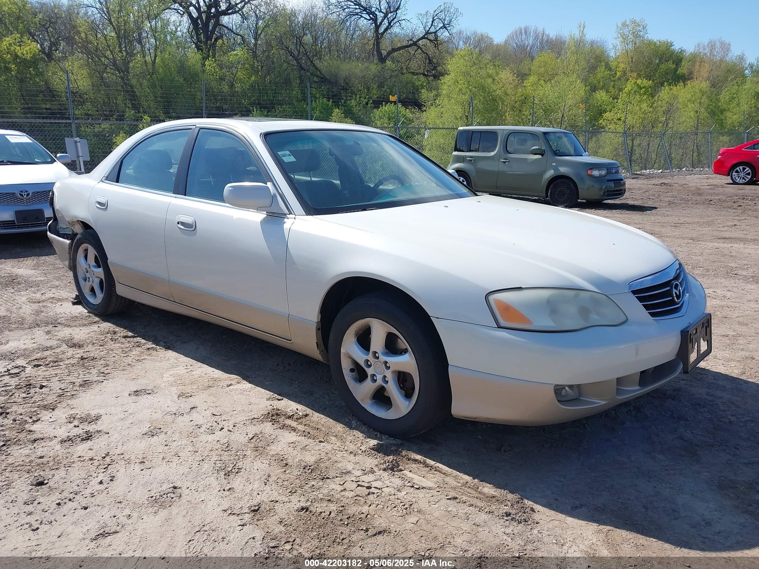 2001 Mazda Millenia, VIN JM1TA221111714677 — Зад