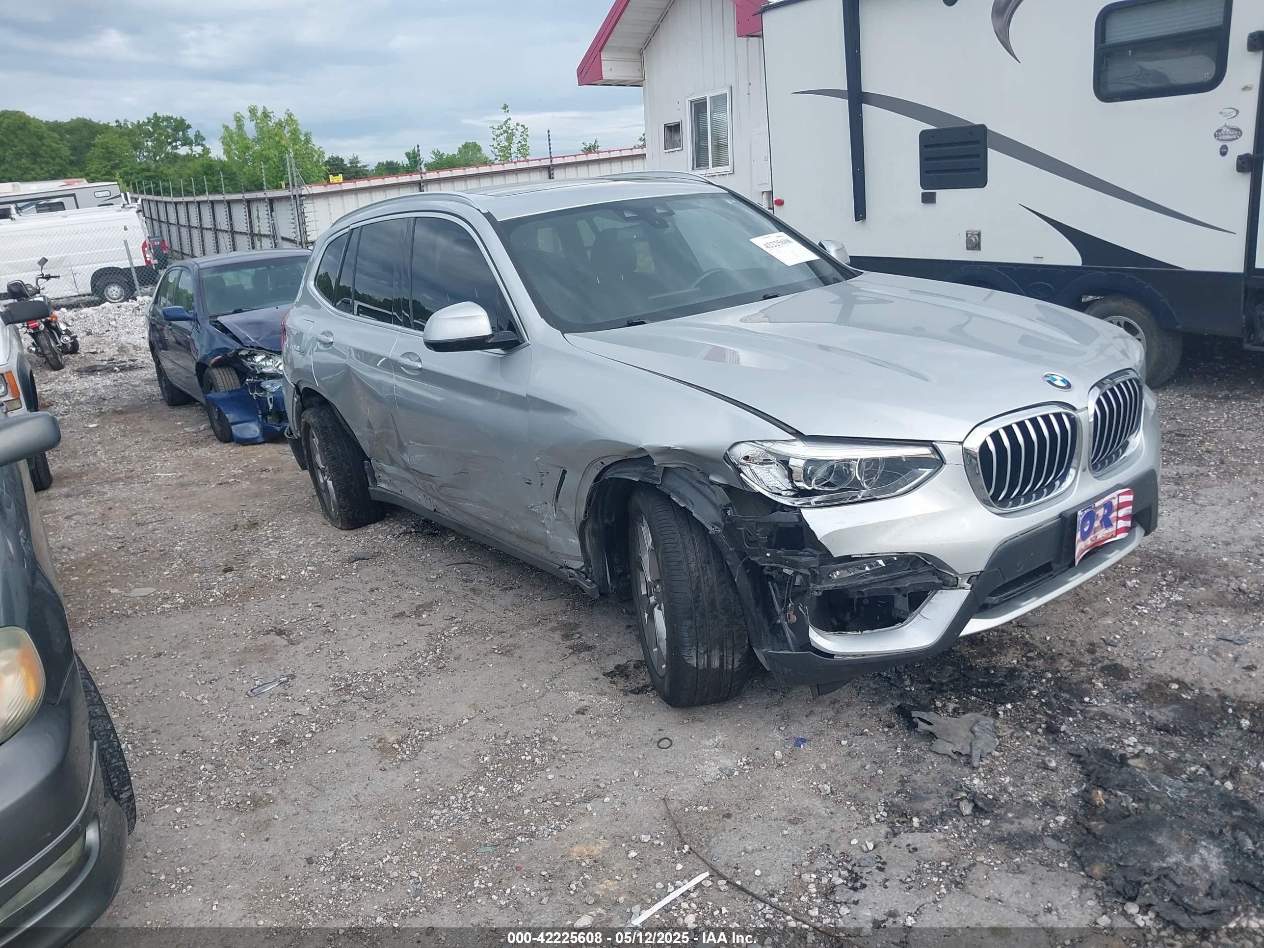 2021 BMW X3 sDrive30i, VIN 5UXTY3C09M9E14741 — Side