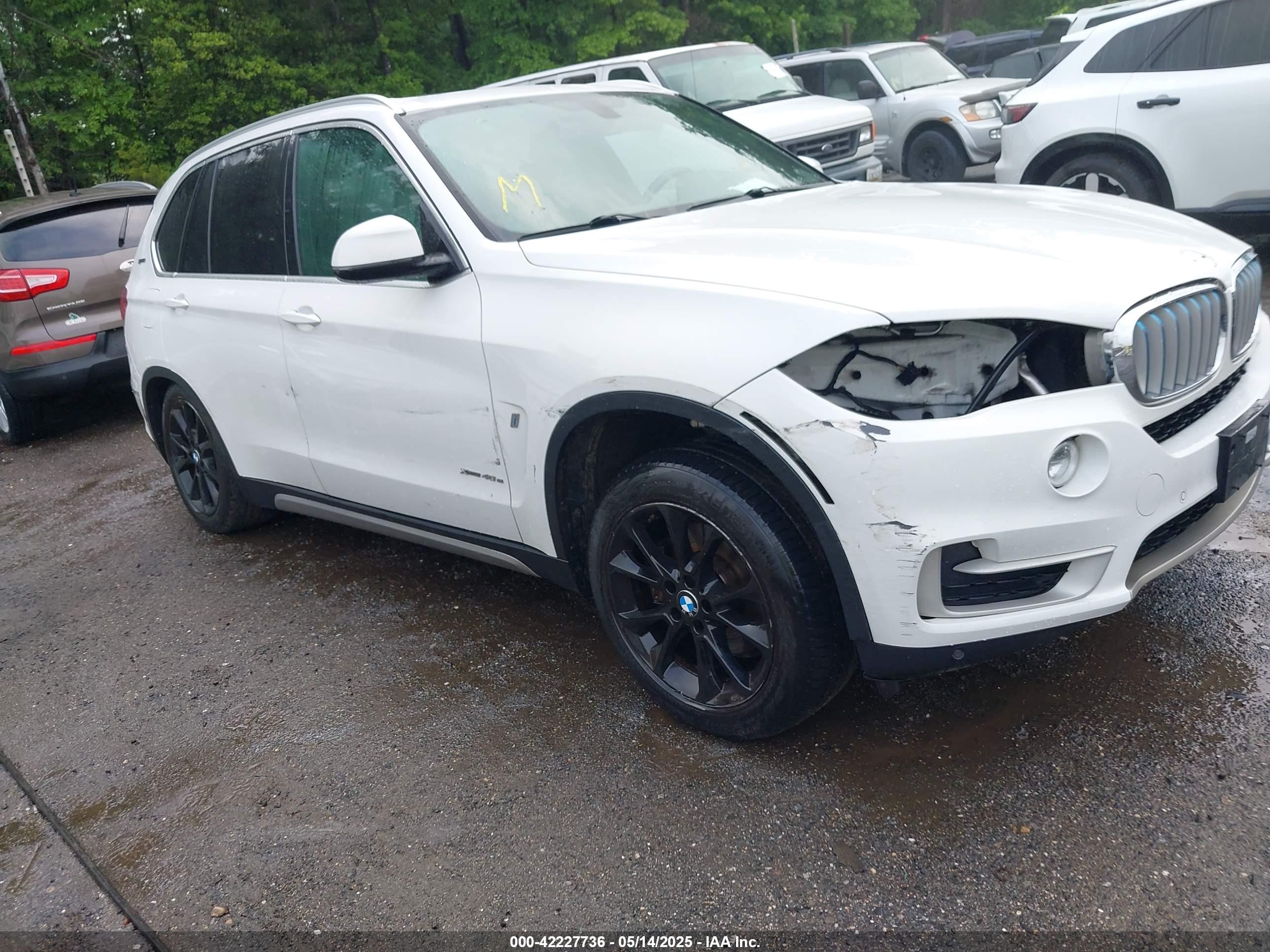 2018 BMW X5 xDrive40e, VIN 5UXKT0C51J0W01277 — Side