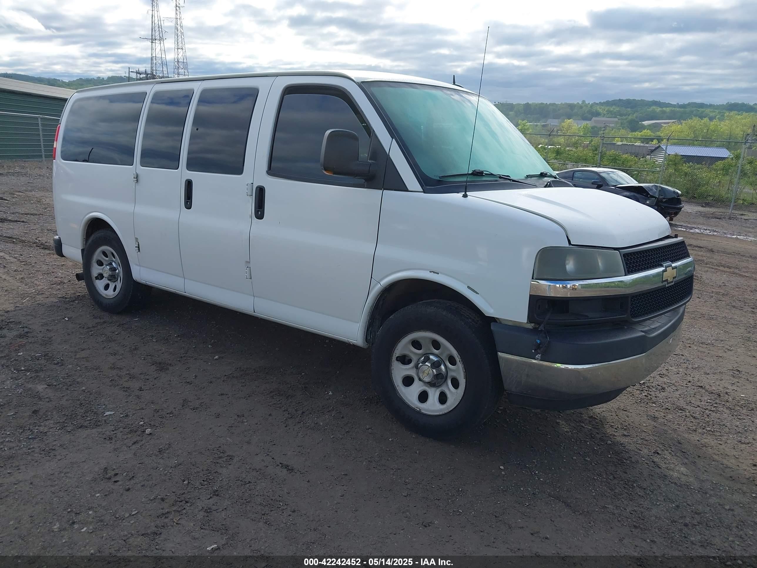 2012 Chevrolet Express 1500, VIN 1GBSGCF43C1141521 — Side