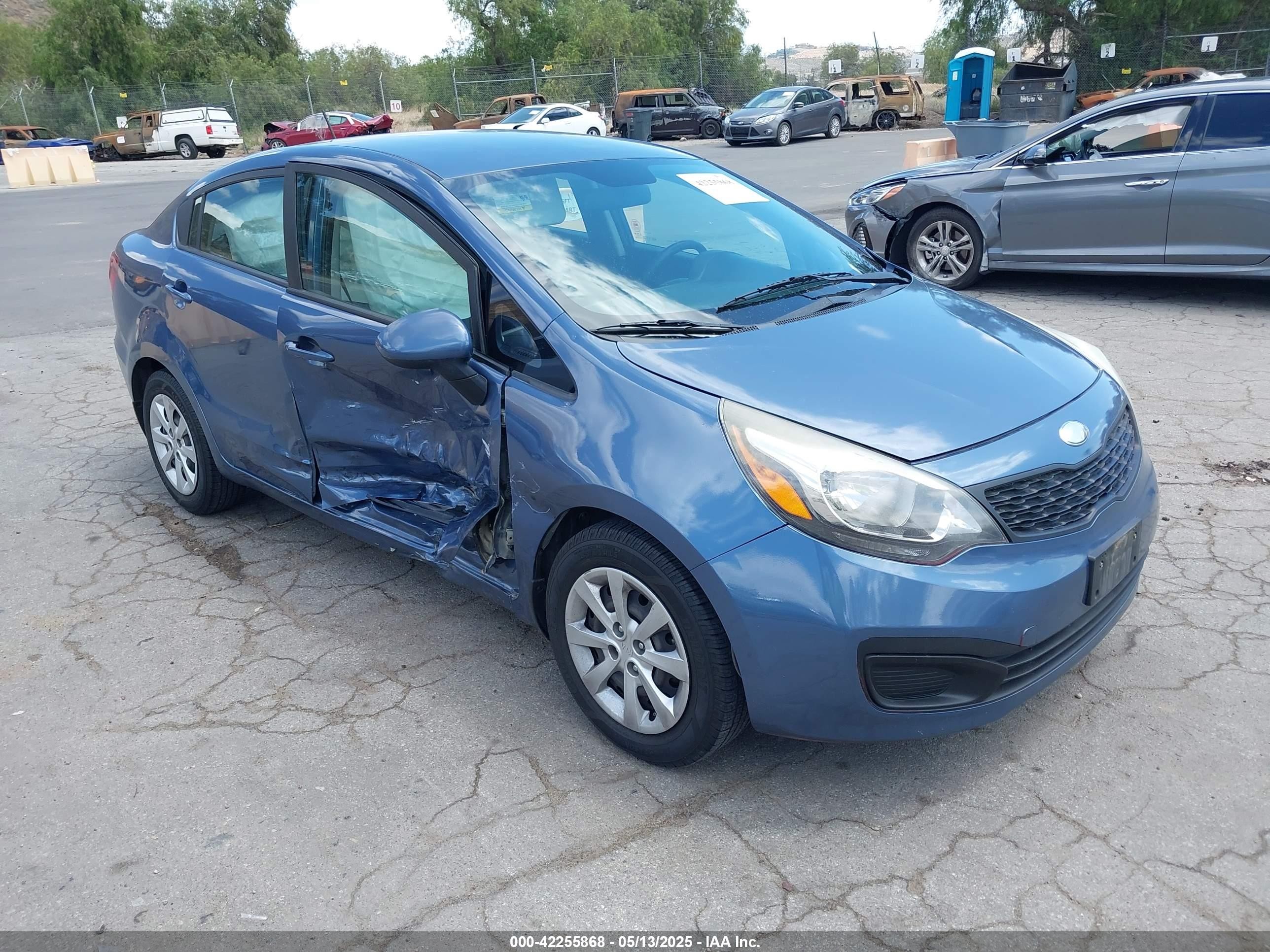 2016 Kia Rio LX, VIN KNADM4A33G6669082 — Side