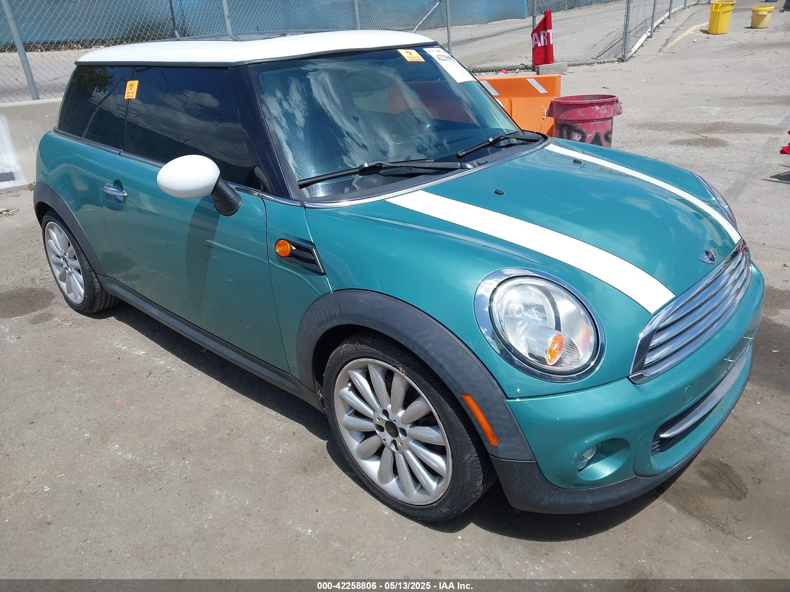 2012 MINI Hardtop, VIN WMWSU3C5XCT257138 — Storm