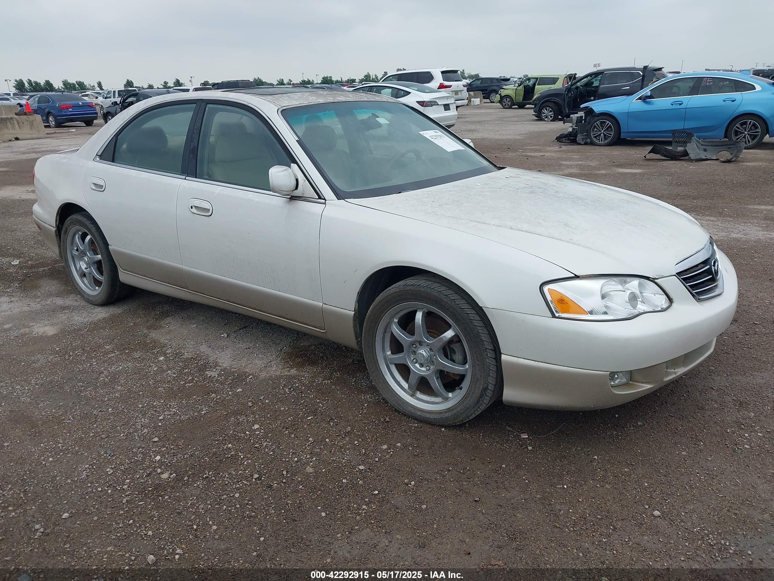2001 Mazda Millenia S, VIN JM1TA222811710618 — Обычный износ