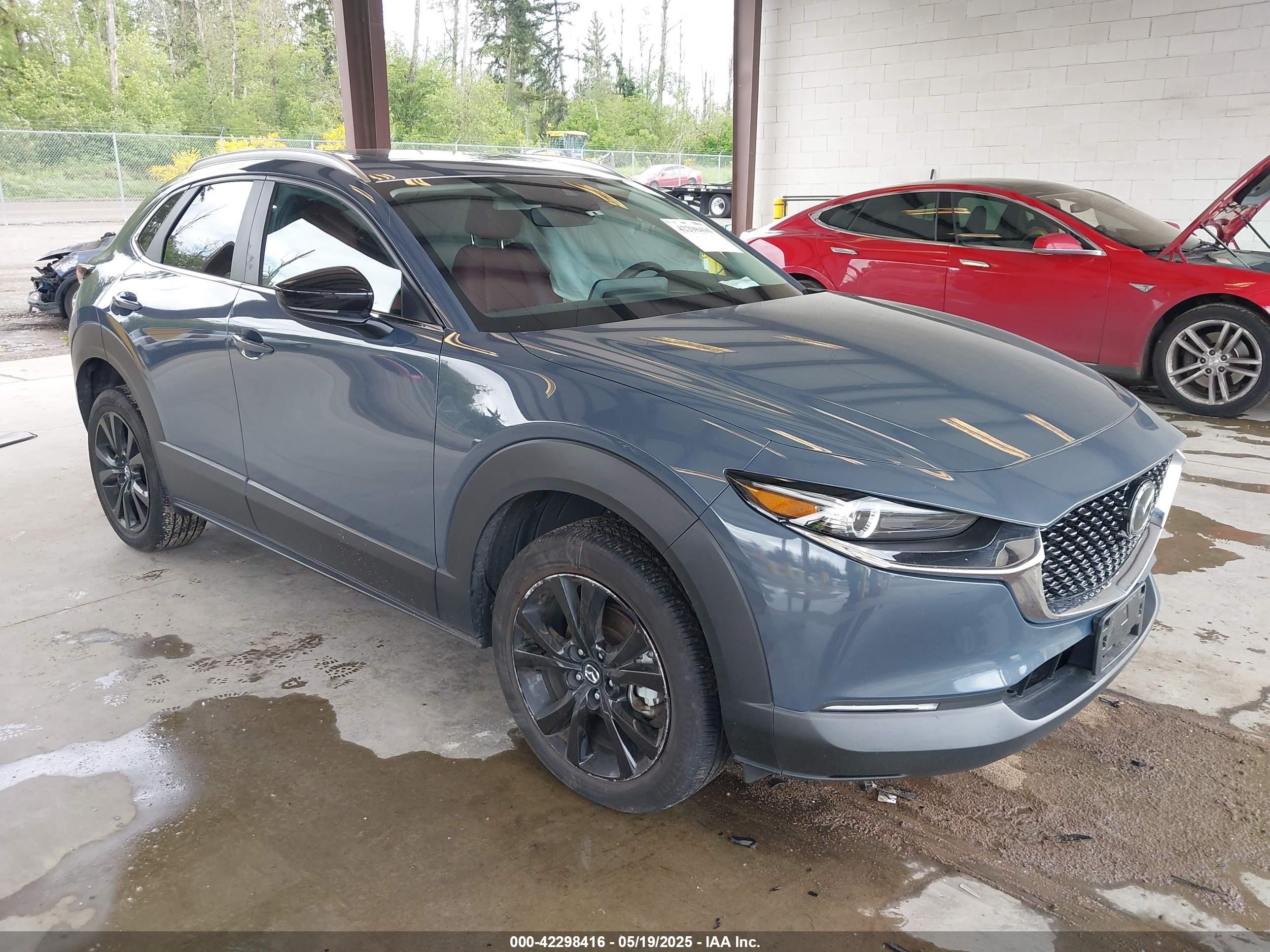 2023 Mazda CX-30 S Carbon Edition, VIN 3MVDMBCM1PM558865 — Side