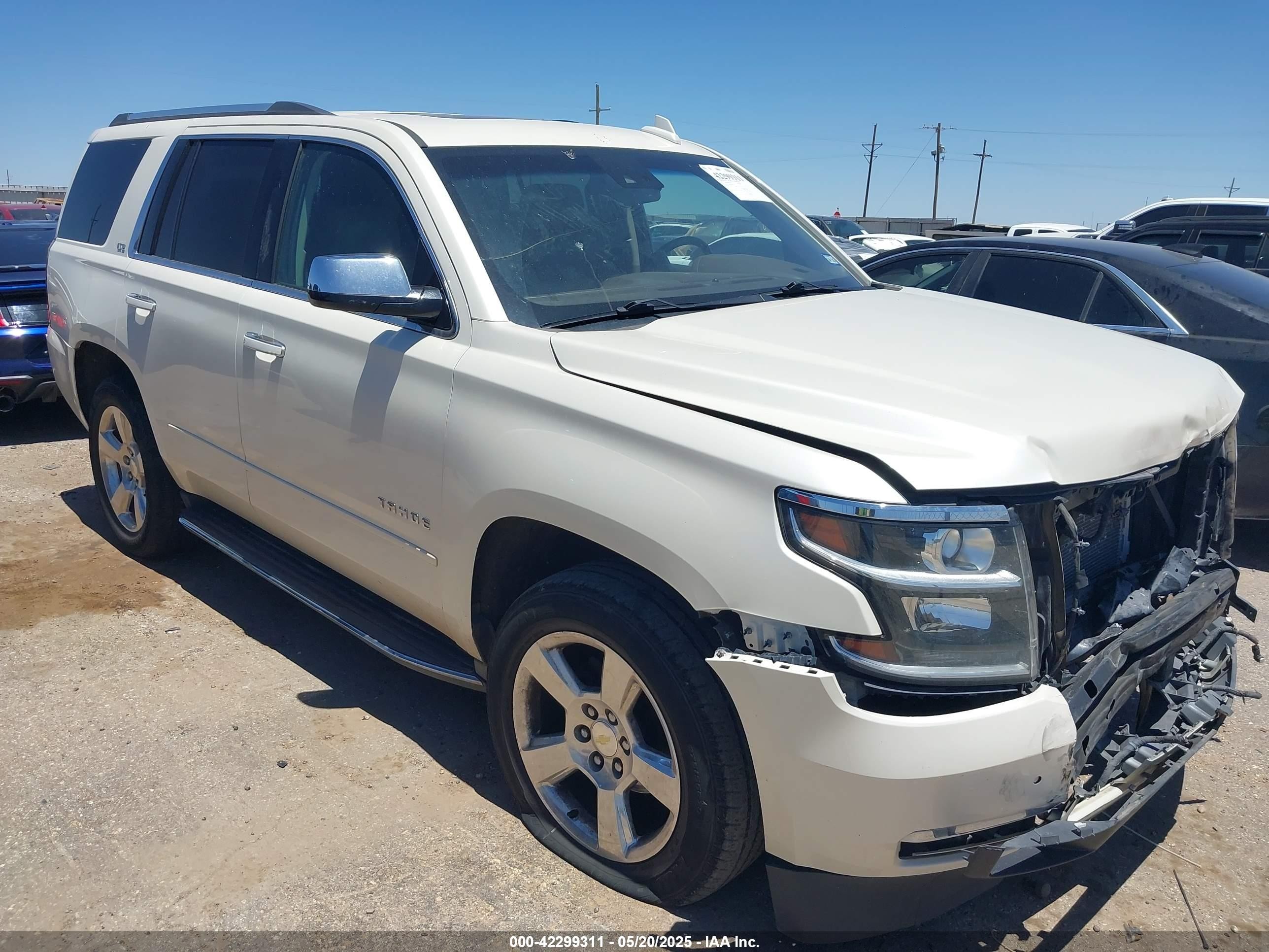 2015 Chevrolet Tahoe LTZ, VIN 1GNSKCKC7FR736148 — Front end