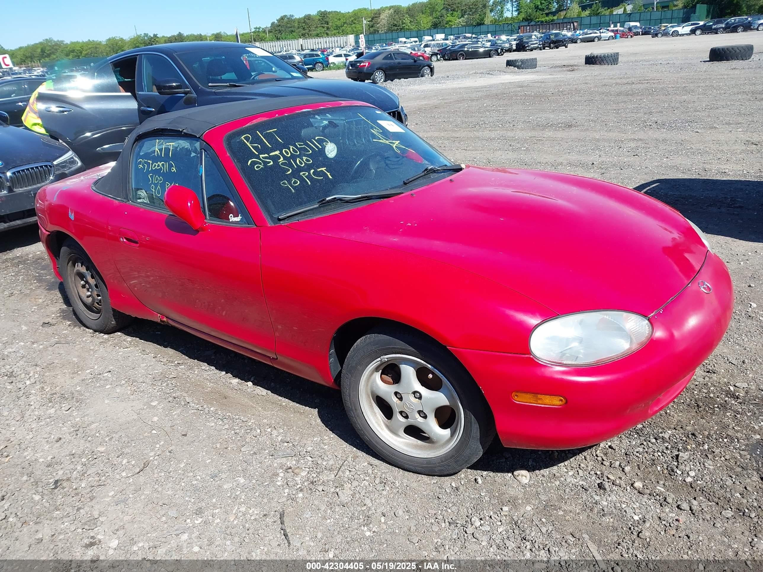 1999 Mazda MX-5 Miata, VIN JM1NB3539X0105084 — Not stated