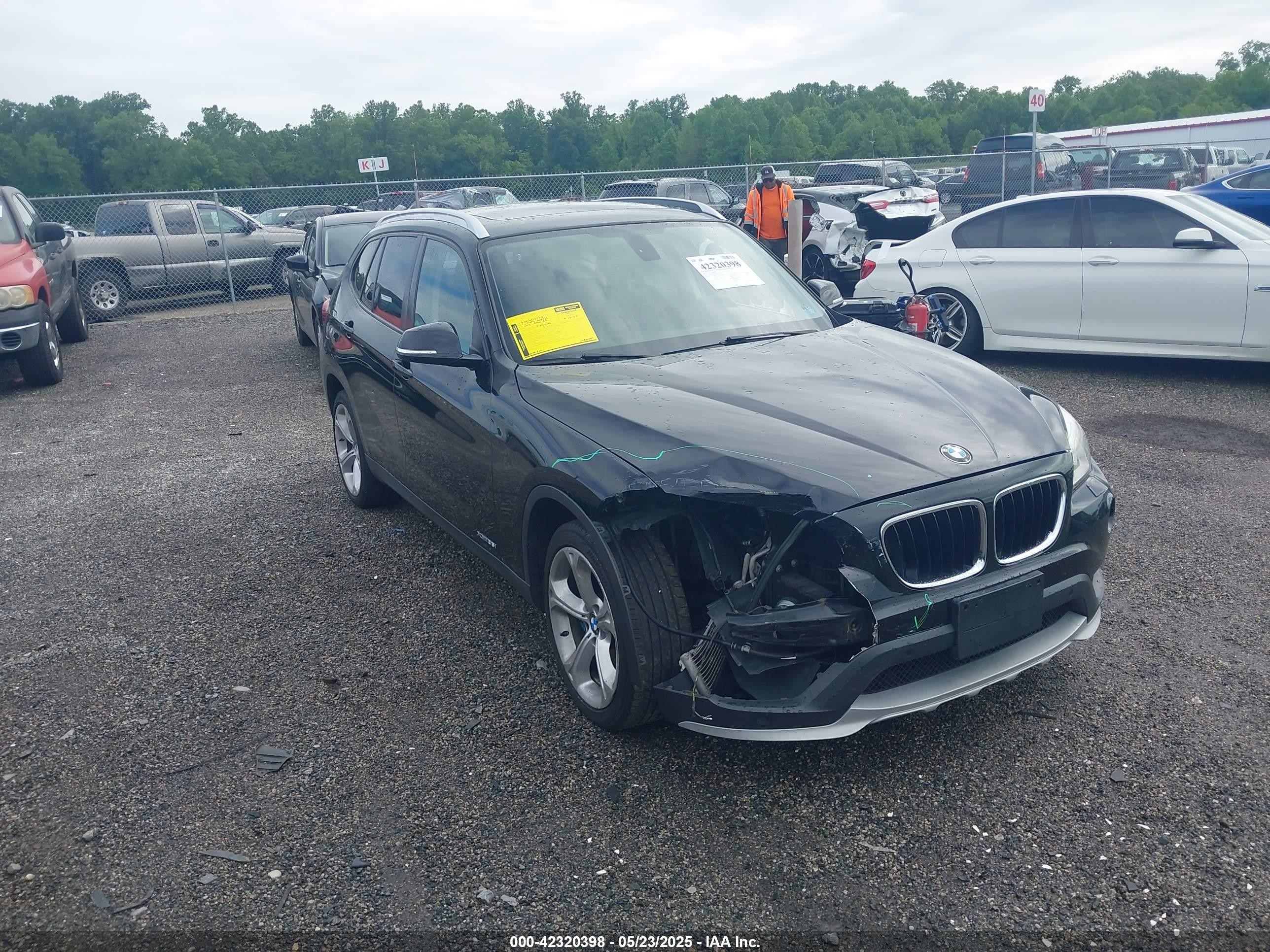 2015 BMW X1 xDrive35i, VIN WBAVM5C59FVV94272 — Front end